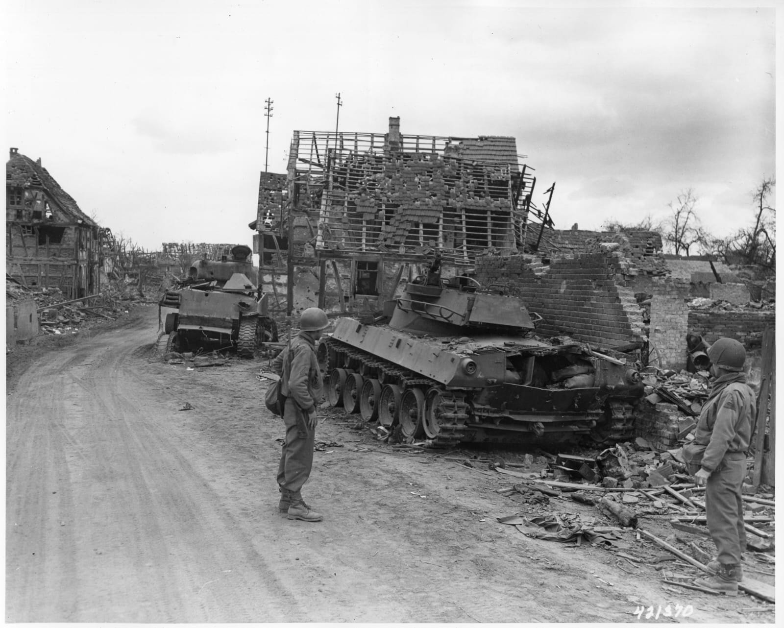 Soldiers in the ruins of the Hatten-Rittershoffen battle in January 1945