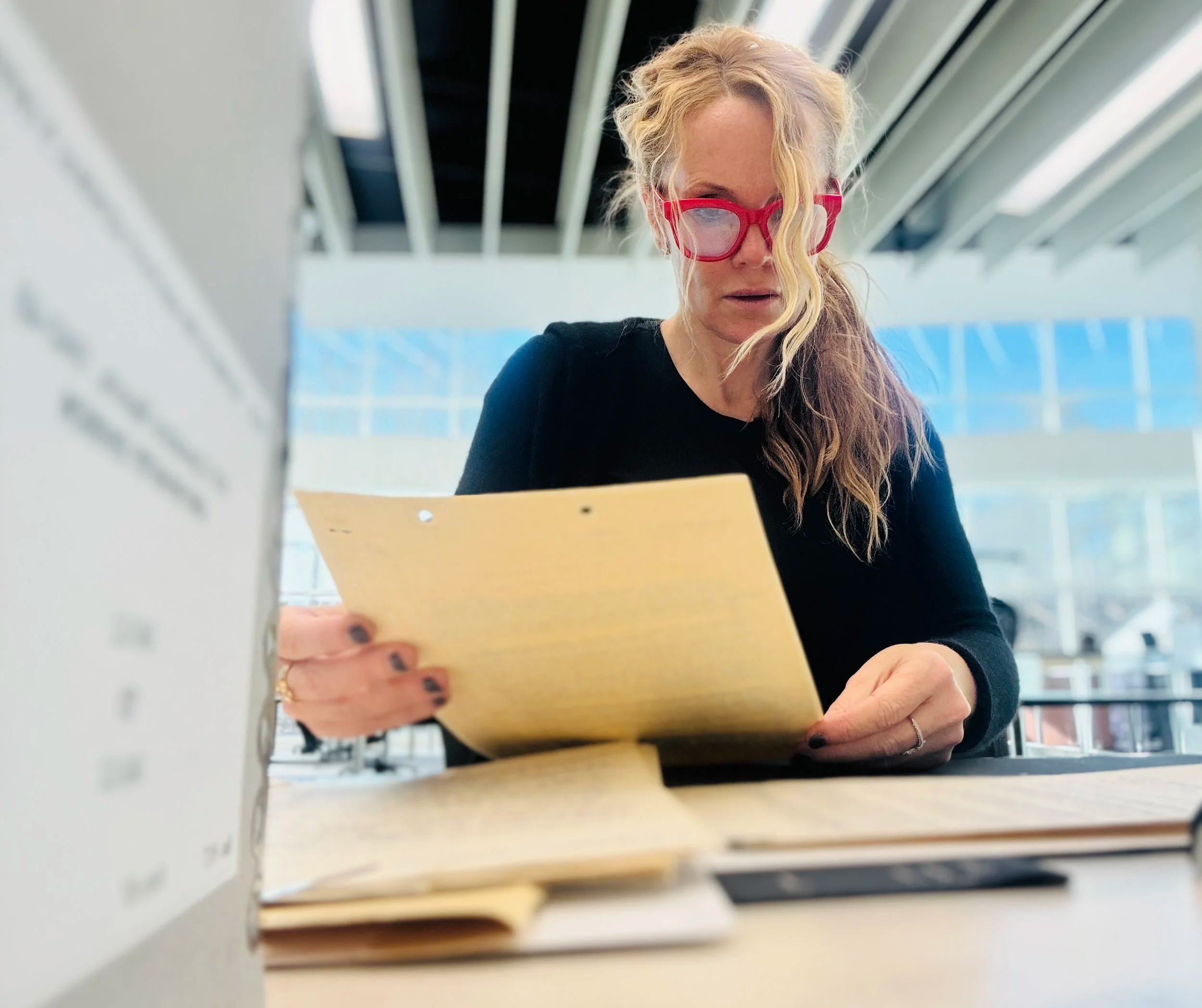 Investigative war historian Erin Faith Allen of Fortitude Research retrieves primary source documentation at the U.S. National Archives in College Park, Maryland.