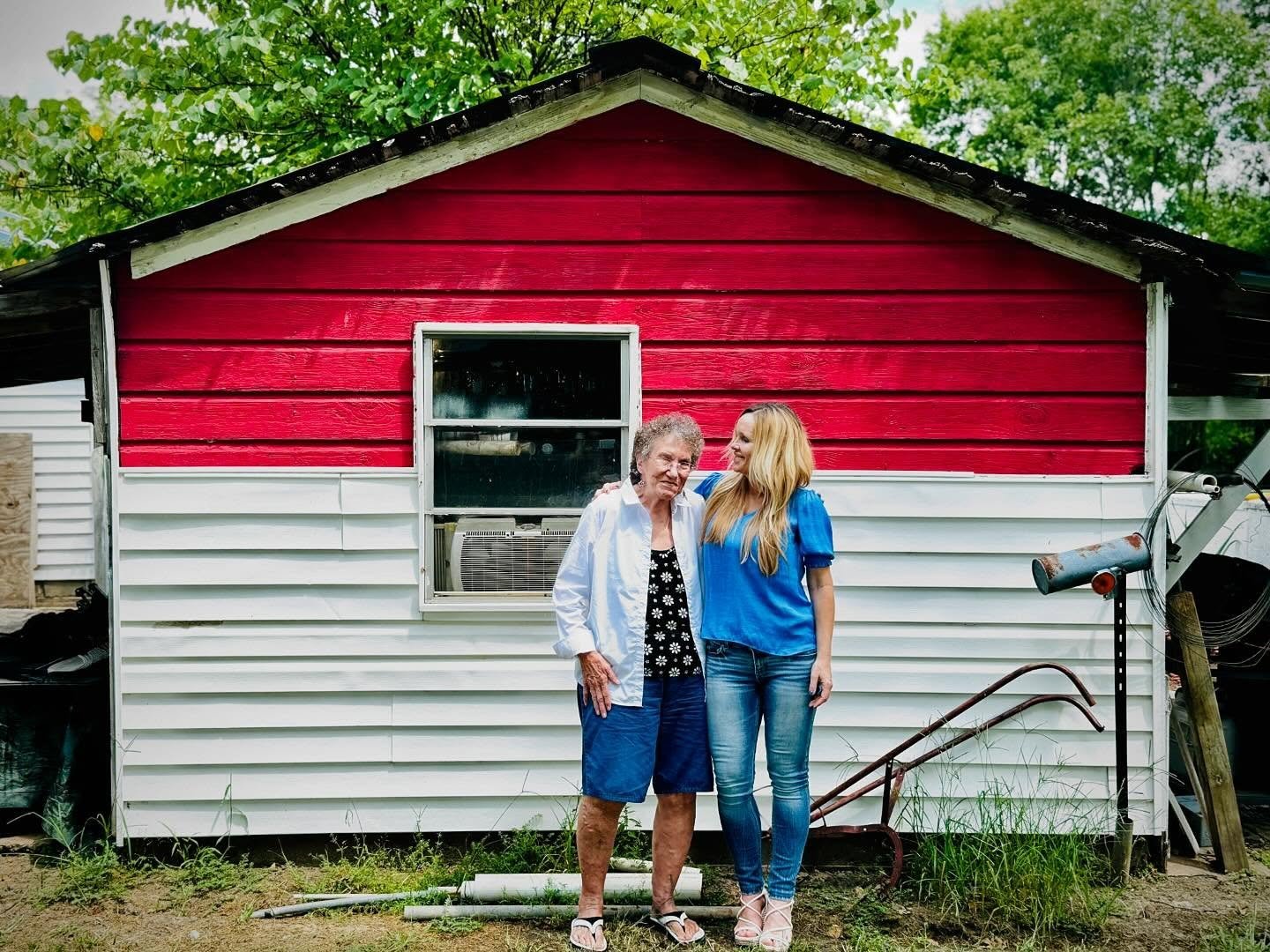 Erin Faith Allen with local historian Judy beside a former Camp Gruber building in Braggs, Oklahoma — 42nd Rainbow Division WWII research, Fortitude Research