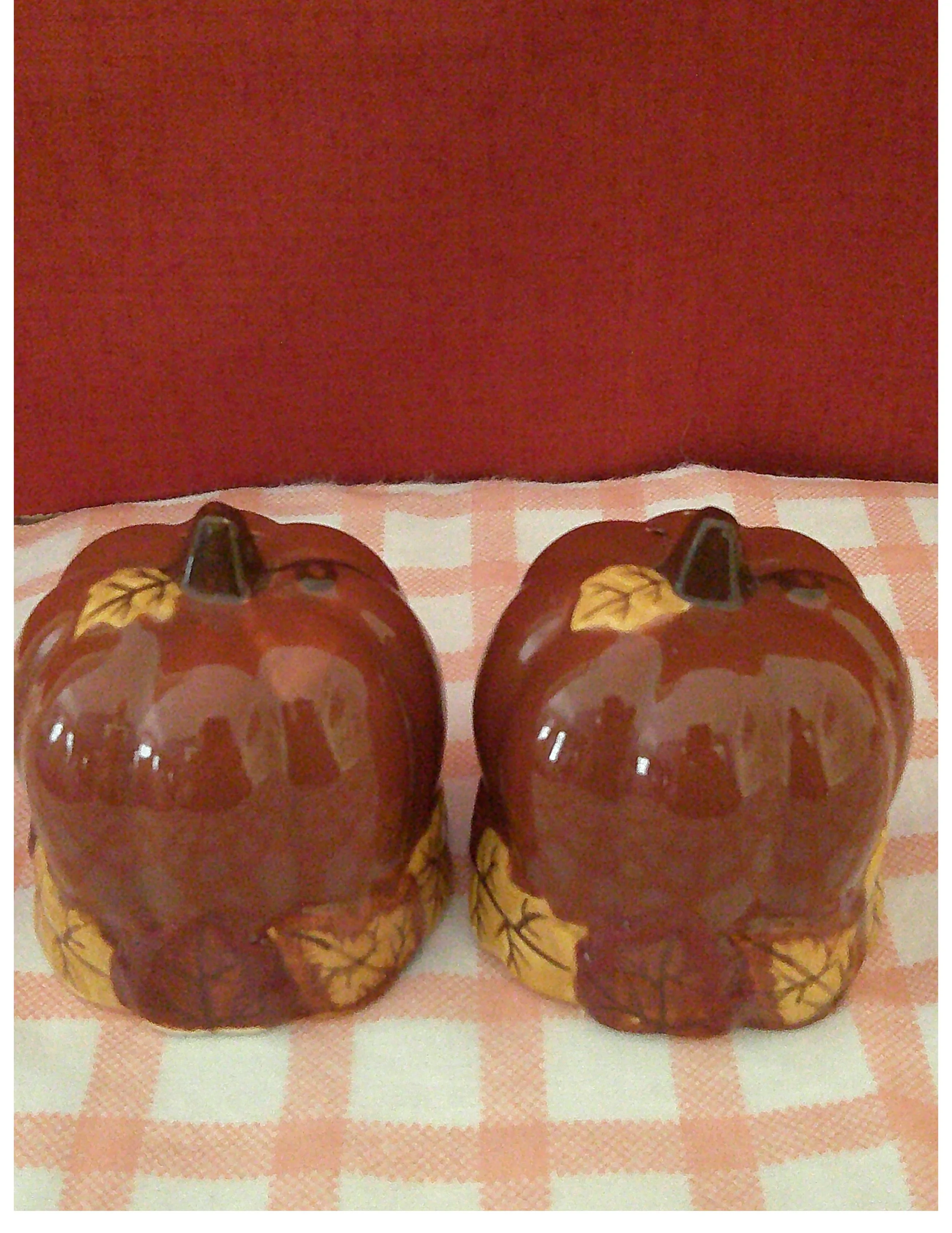 Vintage Ceramic Pumpkin Salt & Pepper Shaker Set, in a dark orange color and Autumn leaves