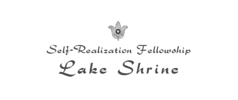Logo for Self-Realization Fellowship Lake Shrine featuring a stylized flower at the top, with the text "Self-Realization Fellowship Lake Shrine" beneath it.