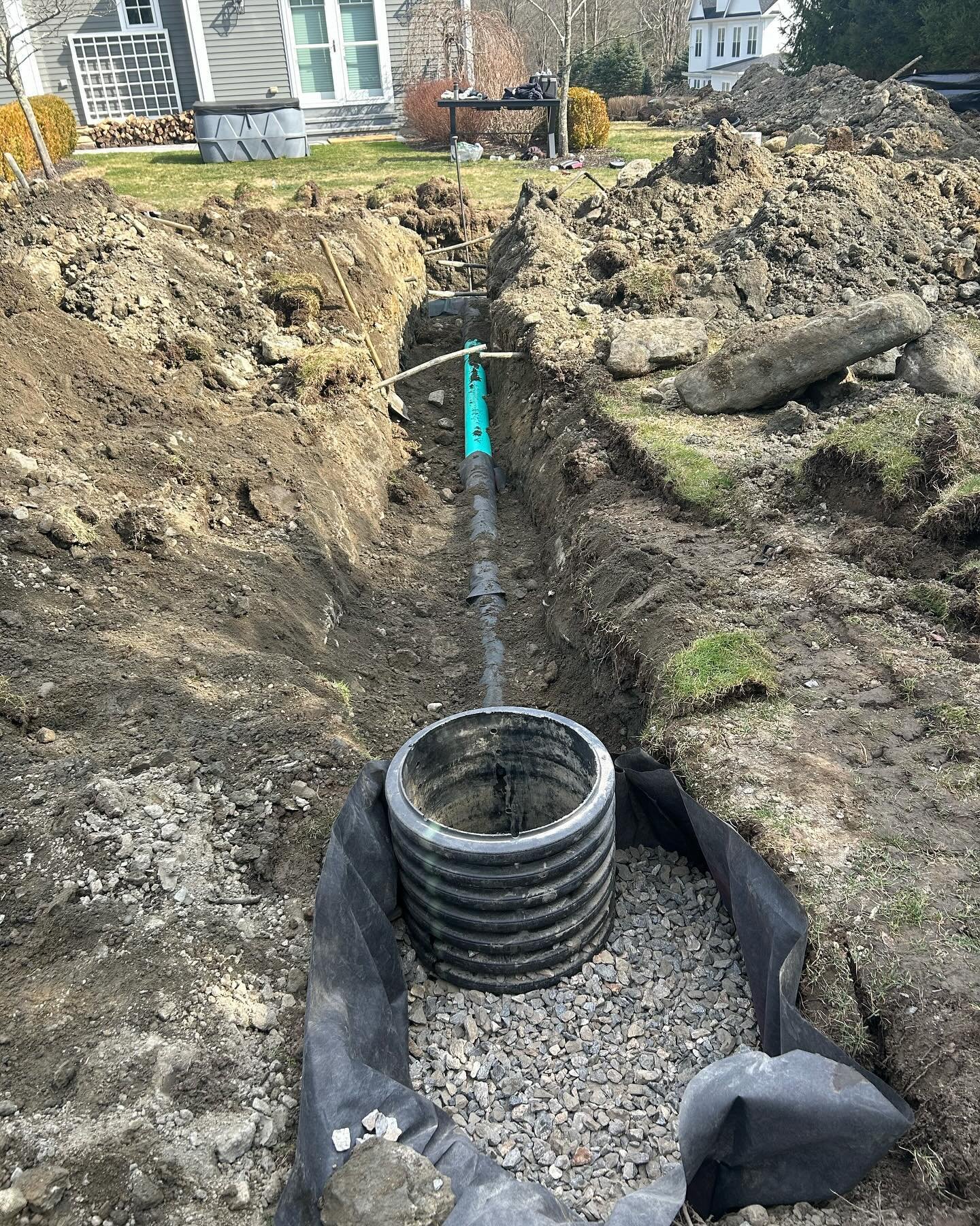Installing pvc pipes and catch basins in wetland property. #drainage #drainagework #excavator #excavation #excavating #landscaping