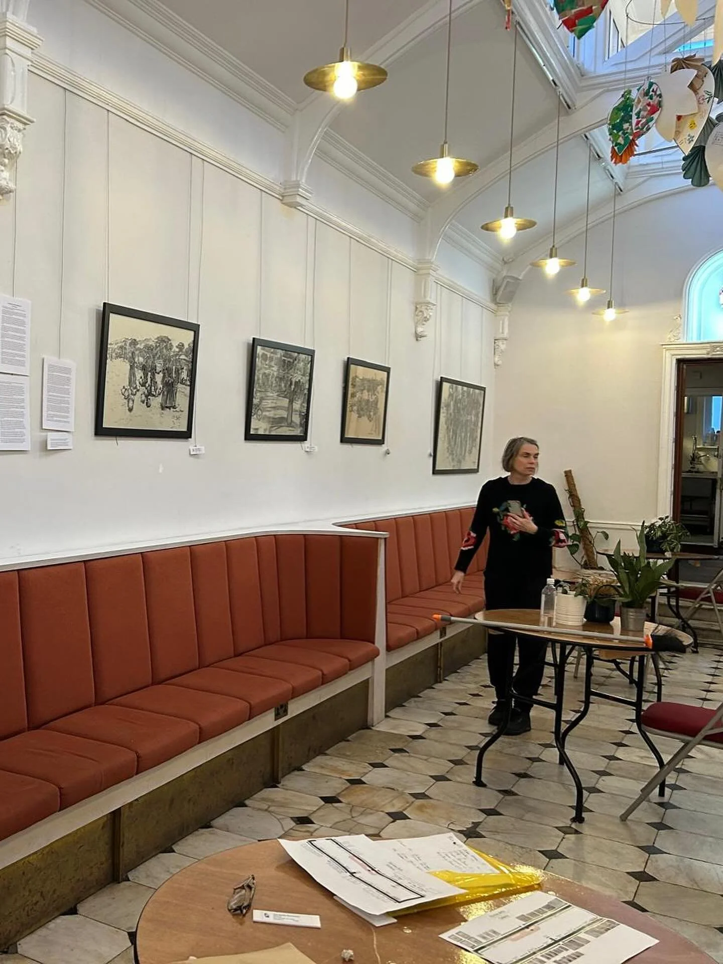 Zoe Parker Illustration checking her artwork and plans at Stanley Arts gallery.jpg