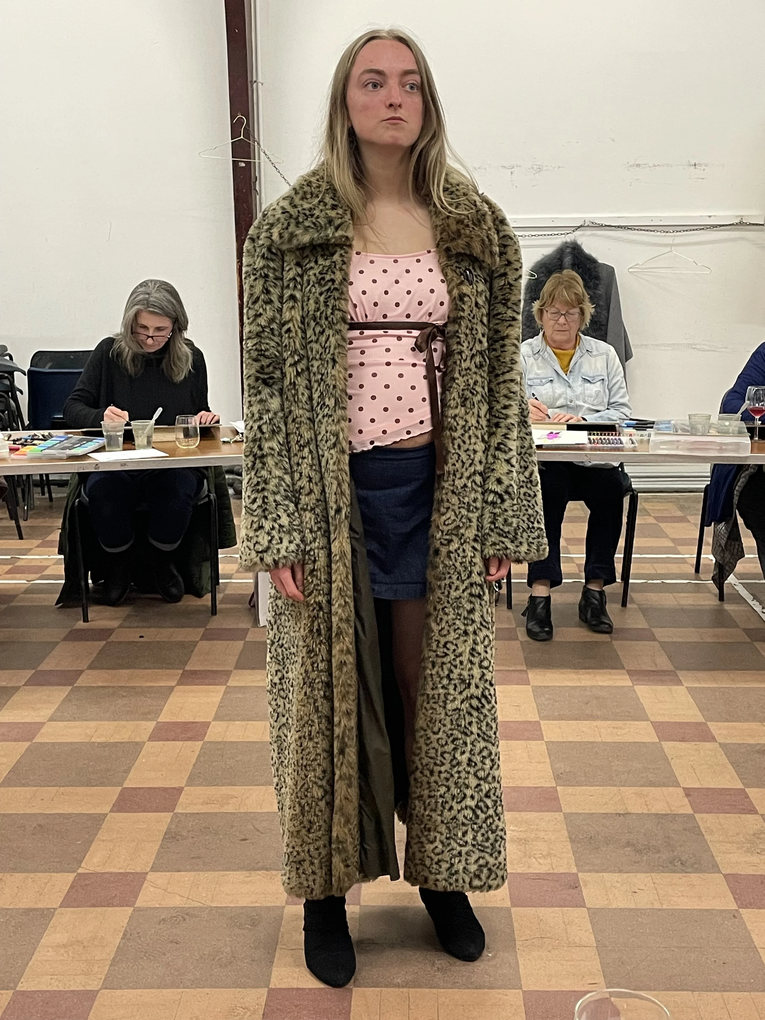 Jasmine looks imposing in floorlength leopard fake fur coat.JPG