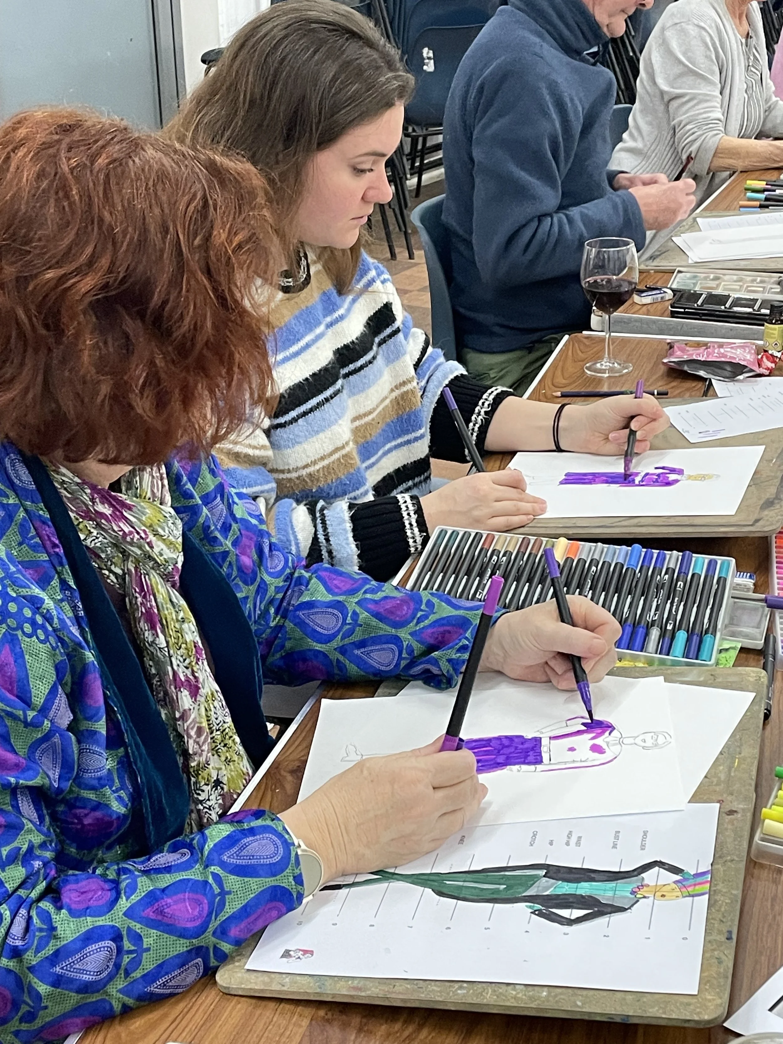 Drawing with a pen in each hand at Dress up and Draw.JPG