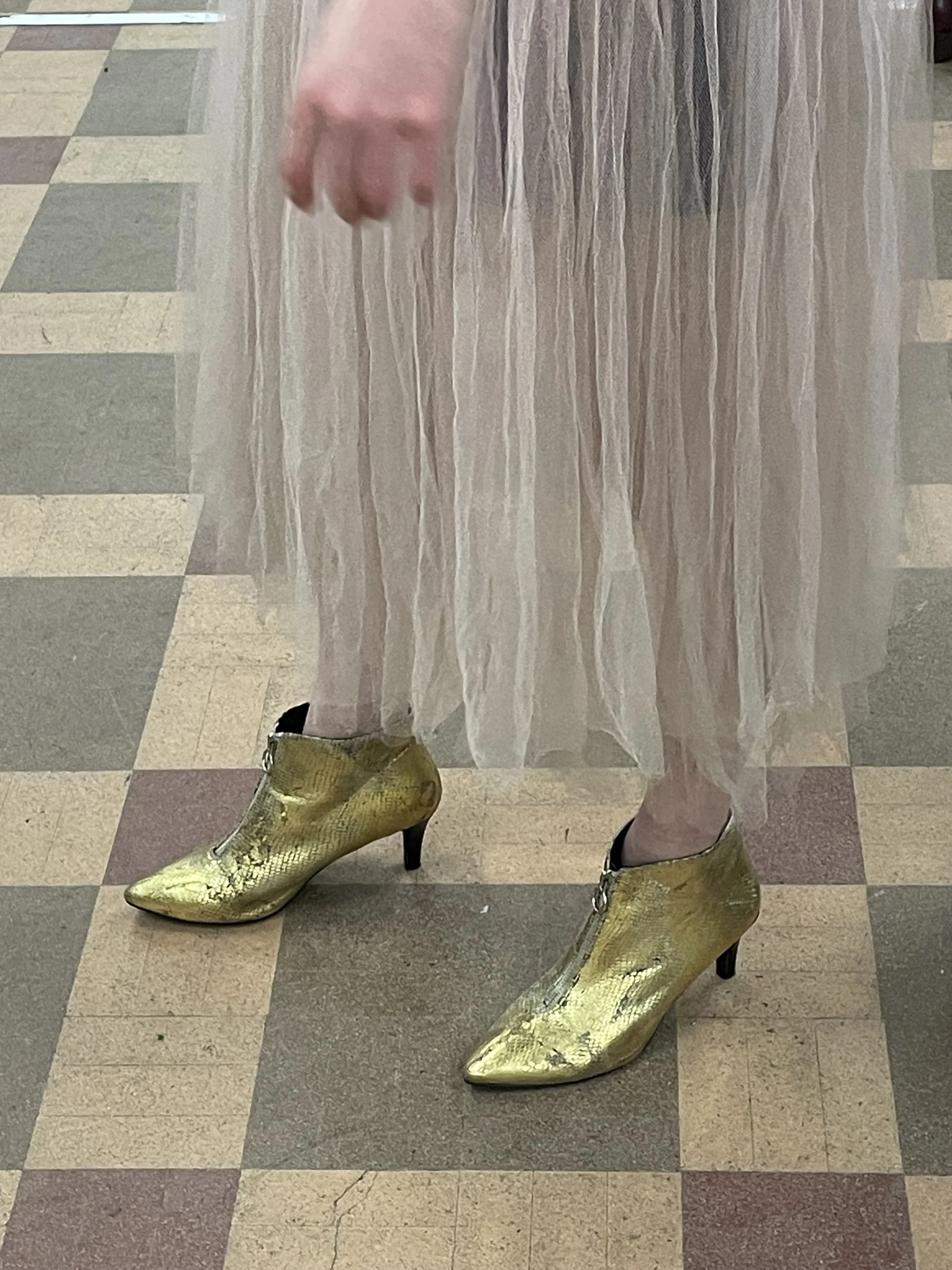 Golden shoes and a pink tutu combination.JPG