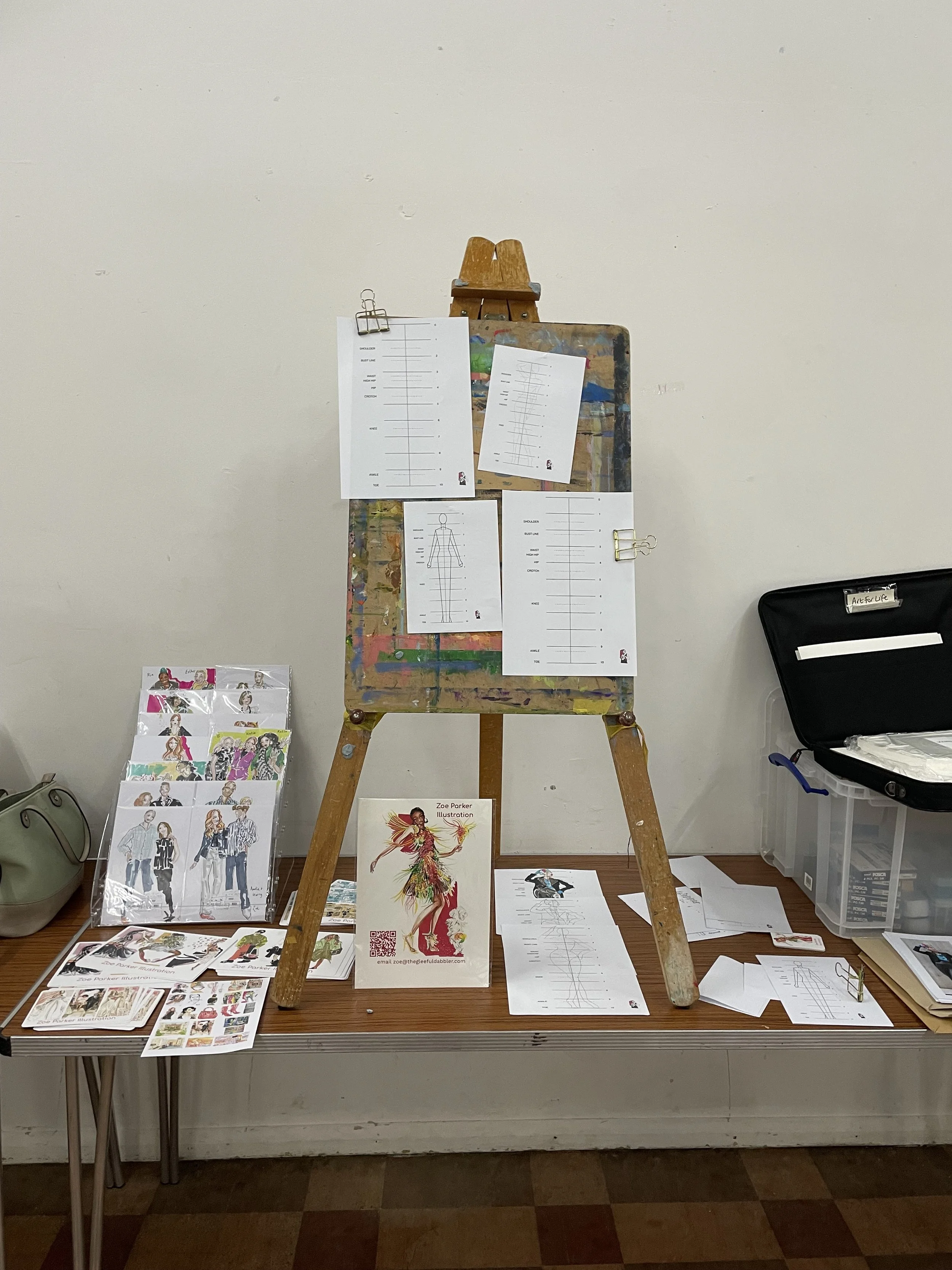 Setting up easel with fashion illustration guidance notes and examples of live illustration.JPG