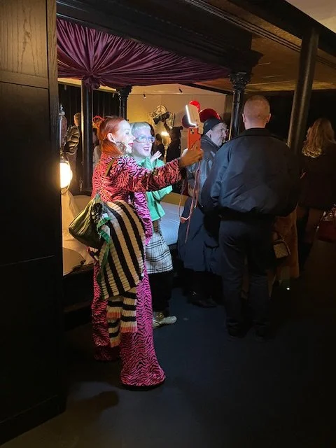 Colourful guests and four poster bed Karina Bond Vivarium.jpg