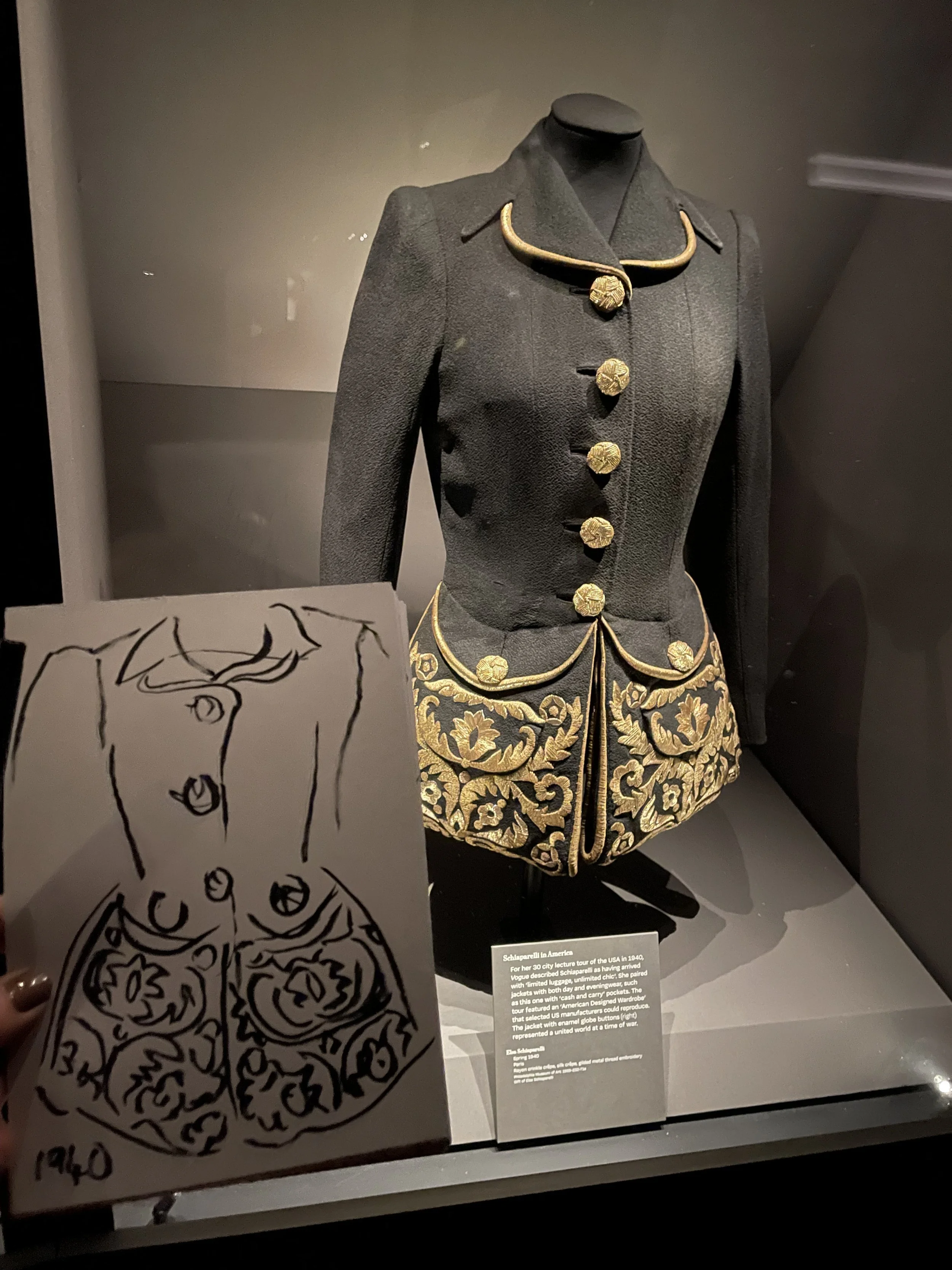 Schiaparelli exhibition sketch of black fitted jacket with gold embroidery sketch by Zoe Parker Illustration.JPEG
