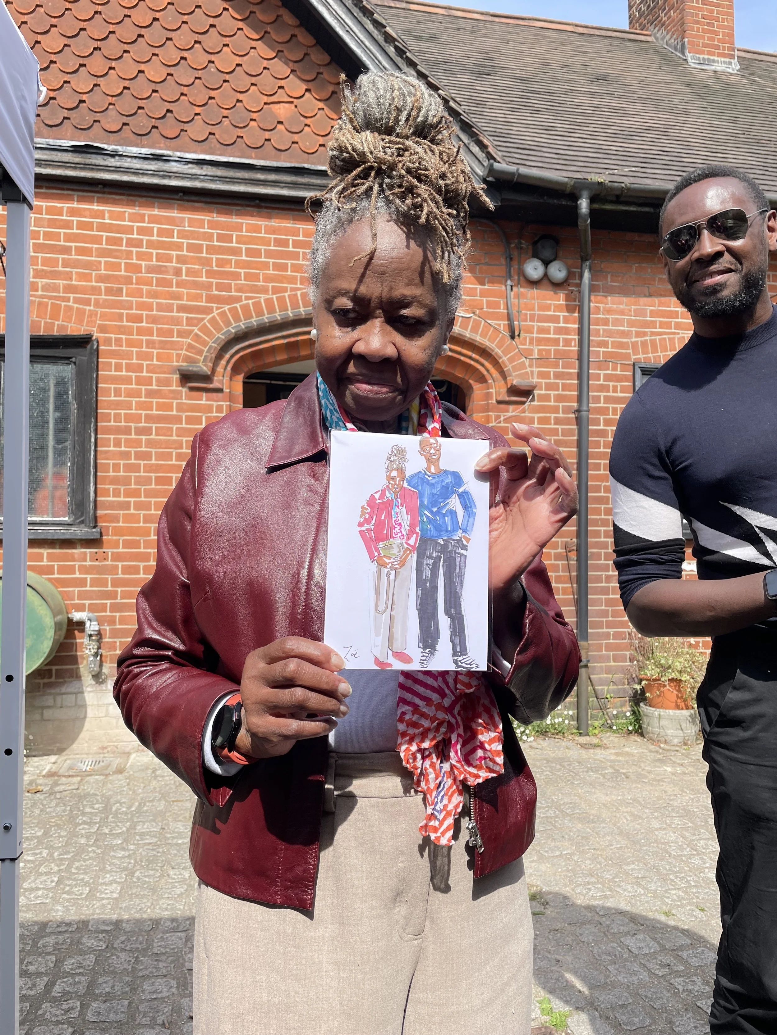 Happy customer with illustration by Zoe Parker Illustration at So Cro Art Pop Up Market Coombe Wood.JPEG