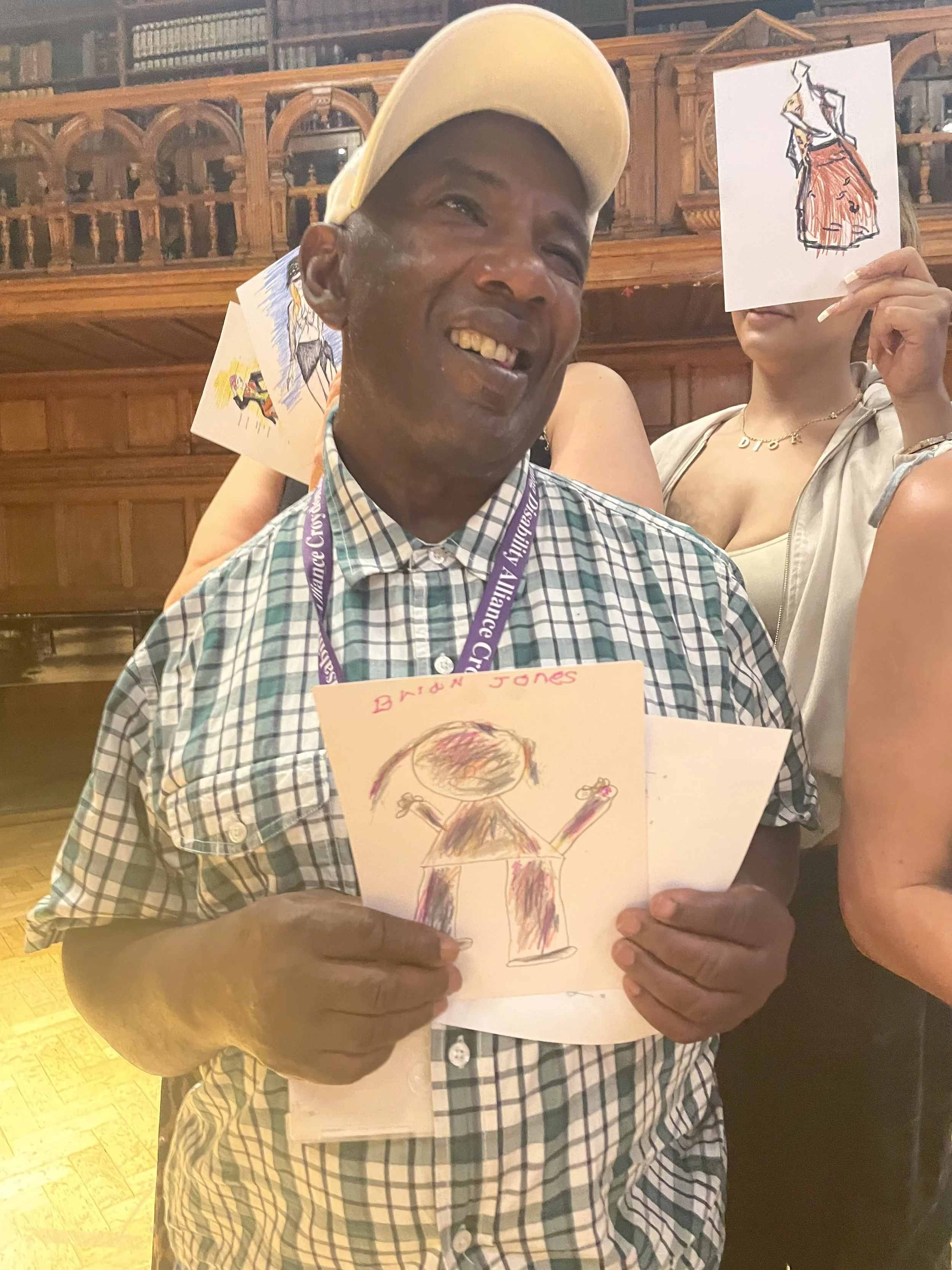 Dress Up and Draw at the Museum of Croydon, participant David with his work..JPG