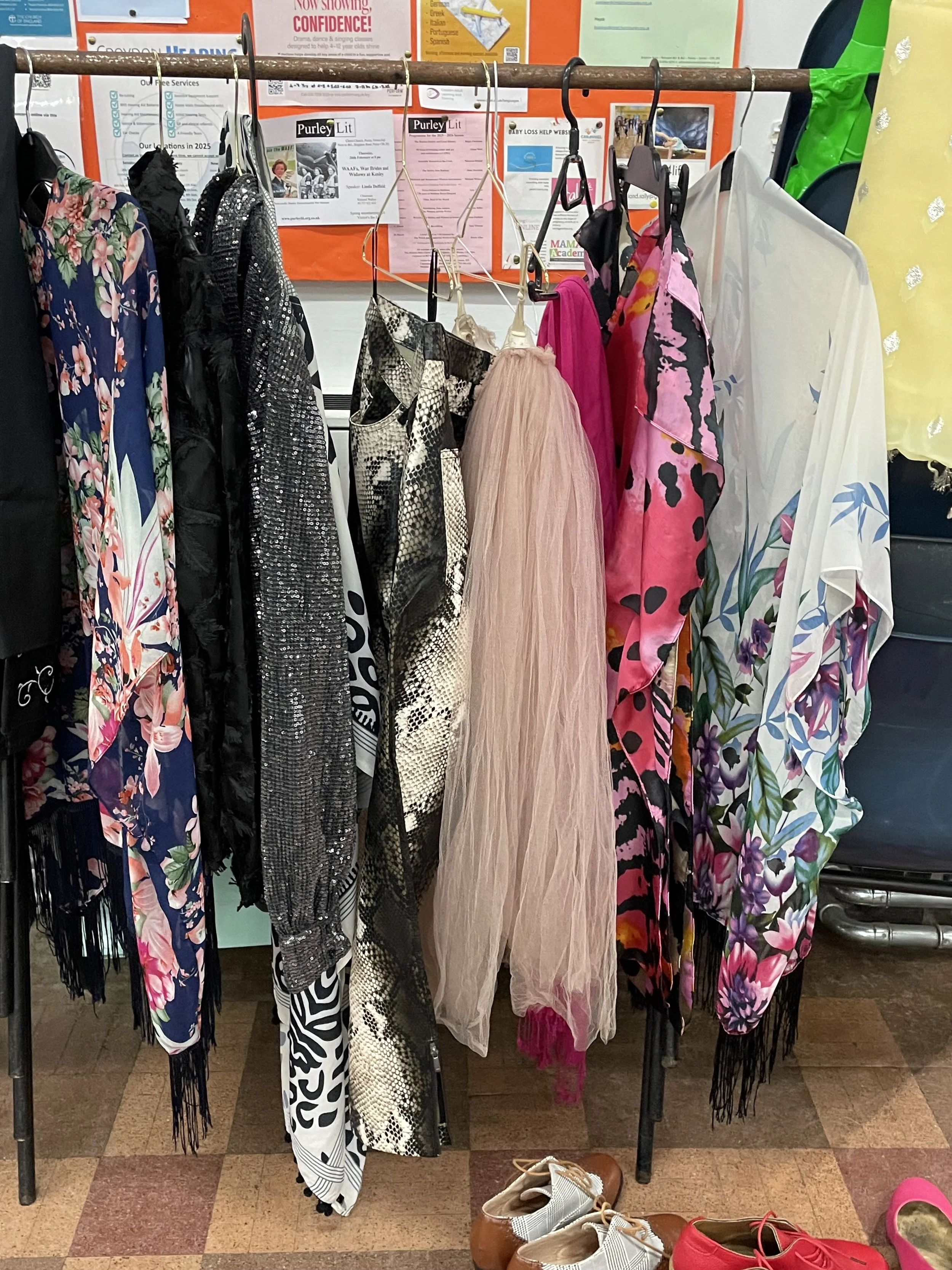 Selection of clothes to choose from at Dress Up and Draw workshop.JPG