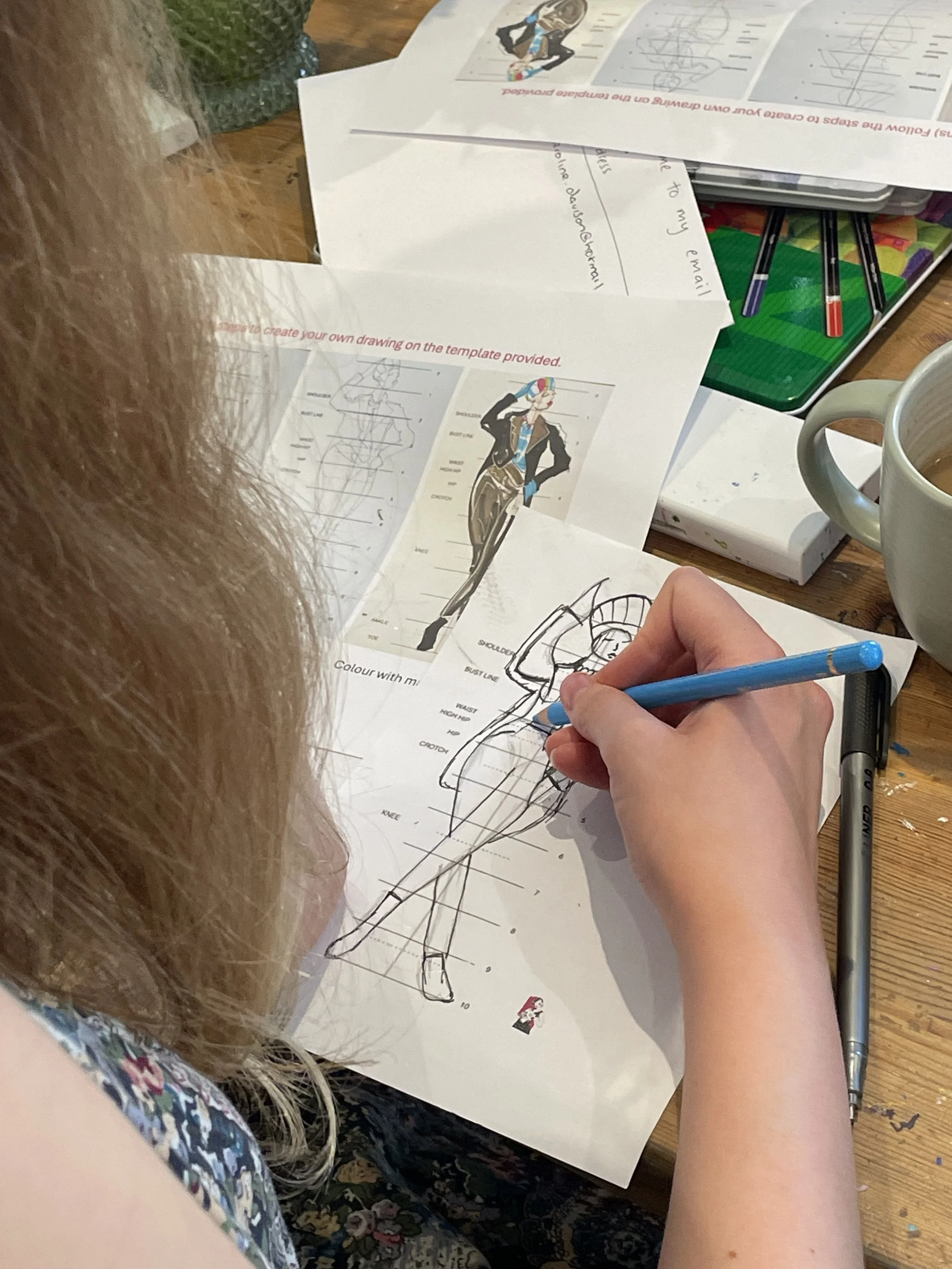 Dress Up and Draw Hive adding colour to fineliner template drawing.JPEG