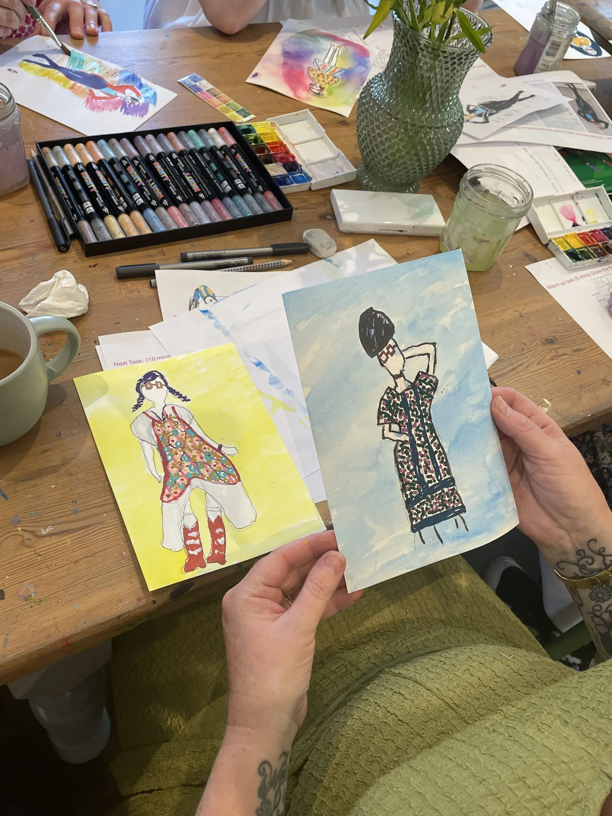 Dress Up and Draw Hive two finished drawings watercolour background.JPEG