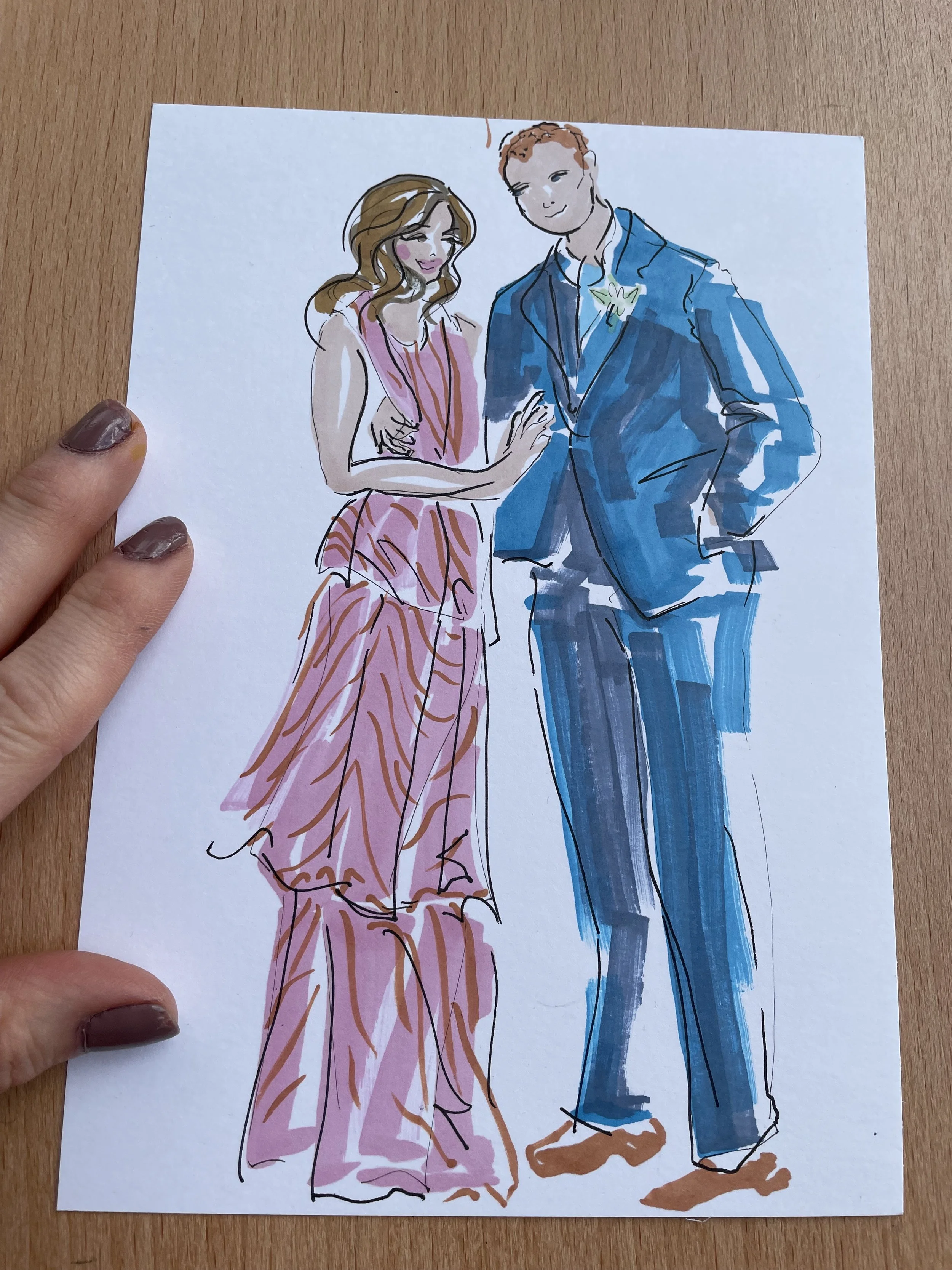 Live wedding illustration of guests at a wedding reception drawn by Zoe Parker Illustration. Woman wears long pink dress, man is wearing a blue suit.