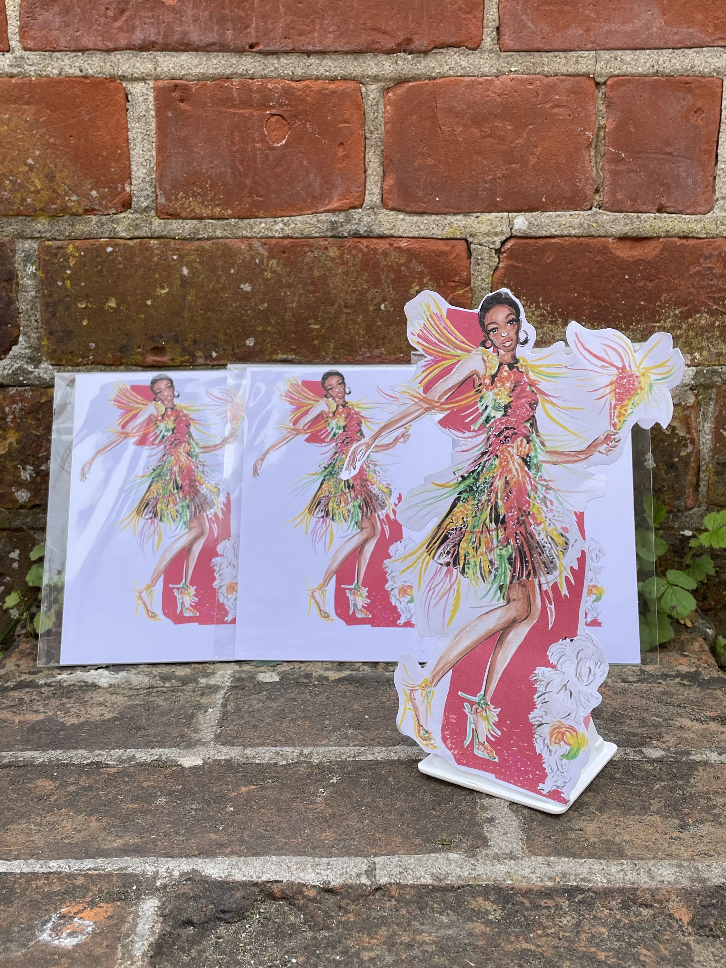 Three prints of Razzle Dazzle Tassel fashion illustration print by Zoe Parker Illustration including a pic of a cardboard cut out dancing doll