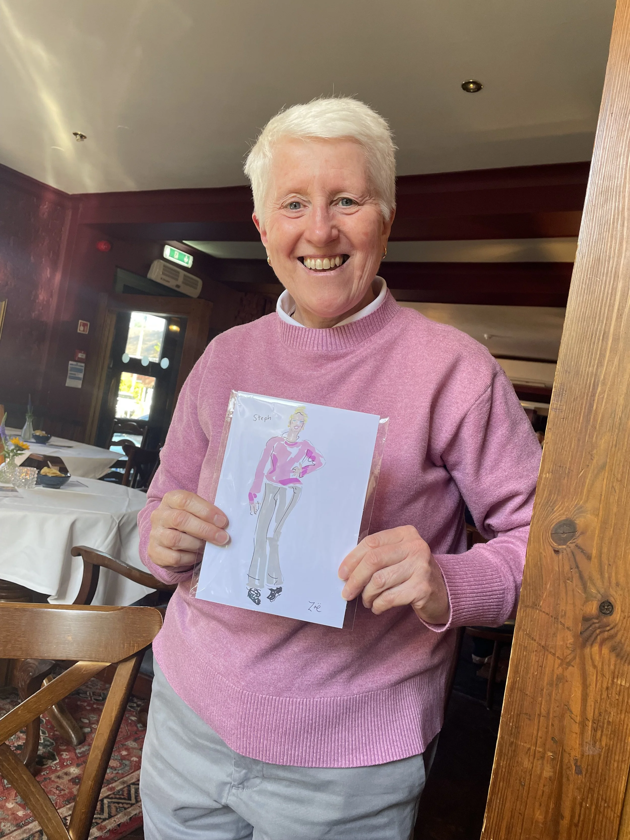 Happy customer in pink jumper