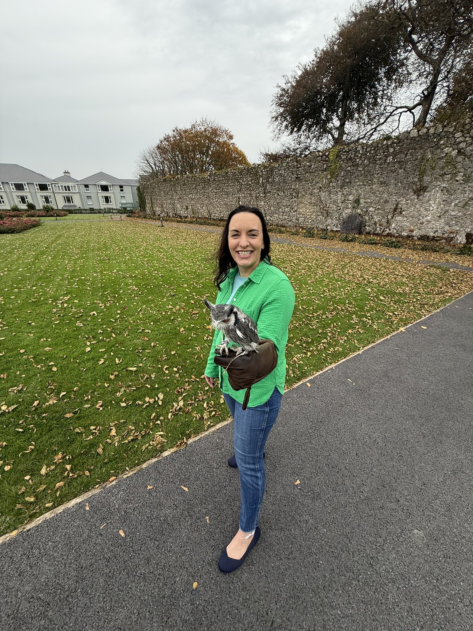 Michaele training an owl in Ireland