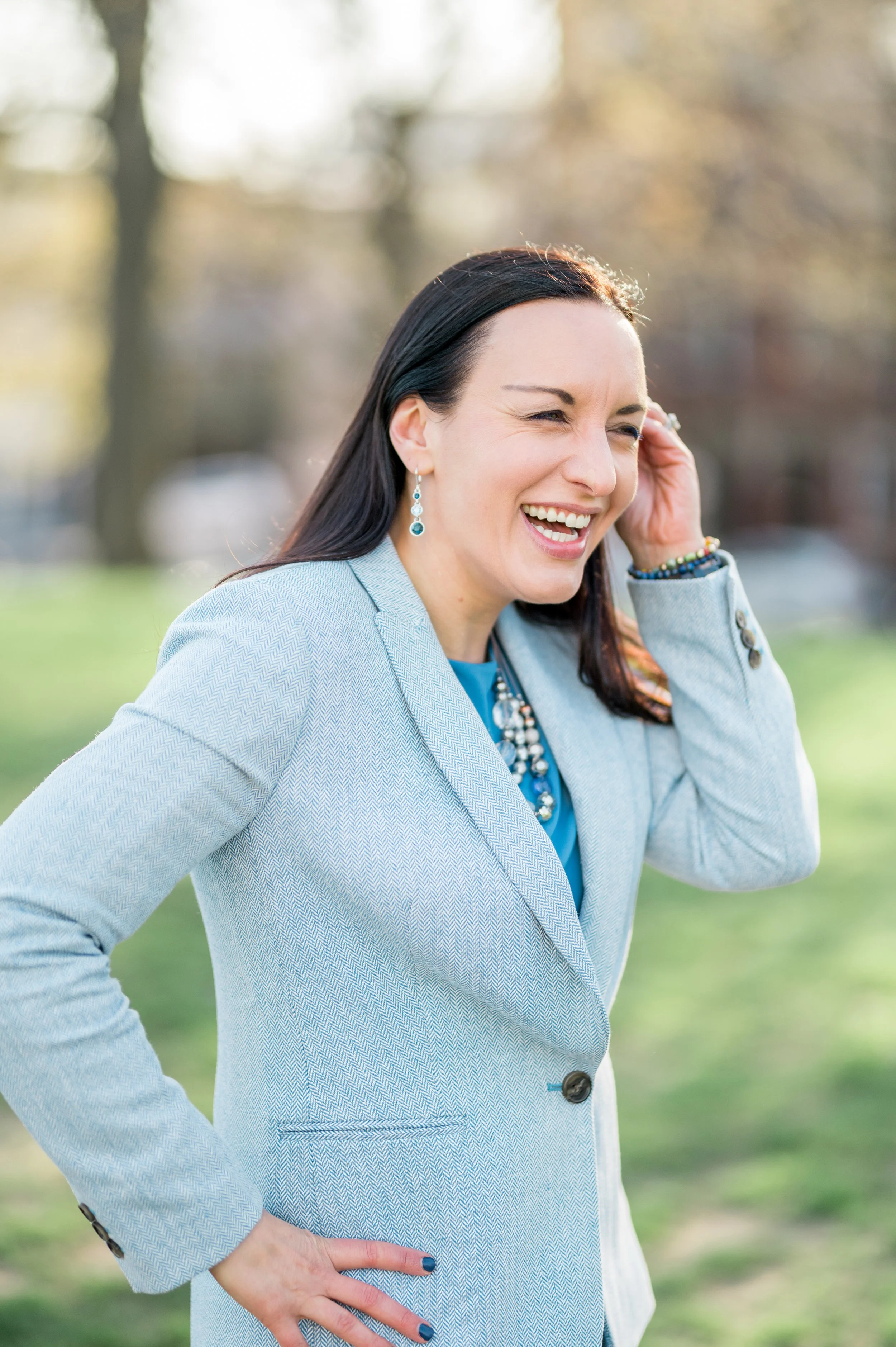 Michaele outside in Boston on a spring day