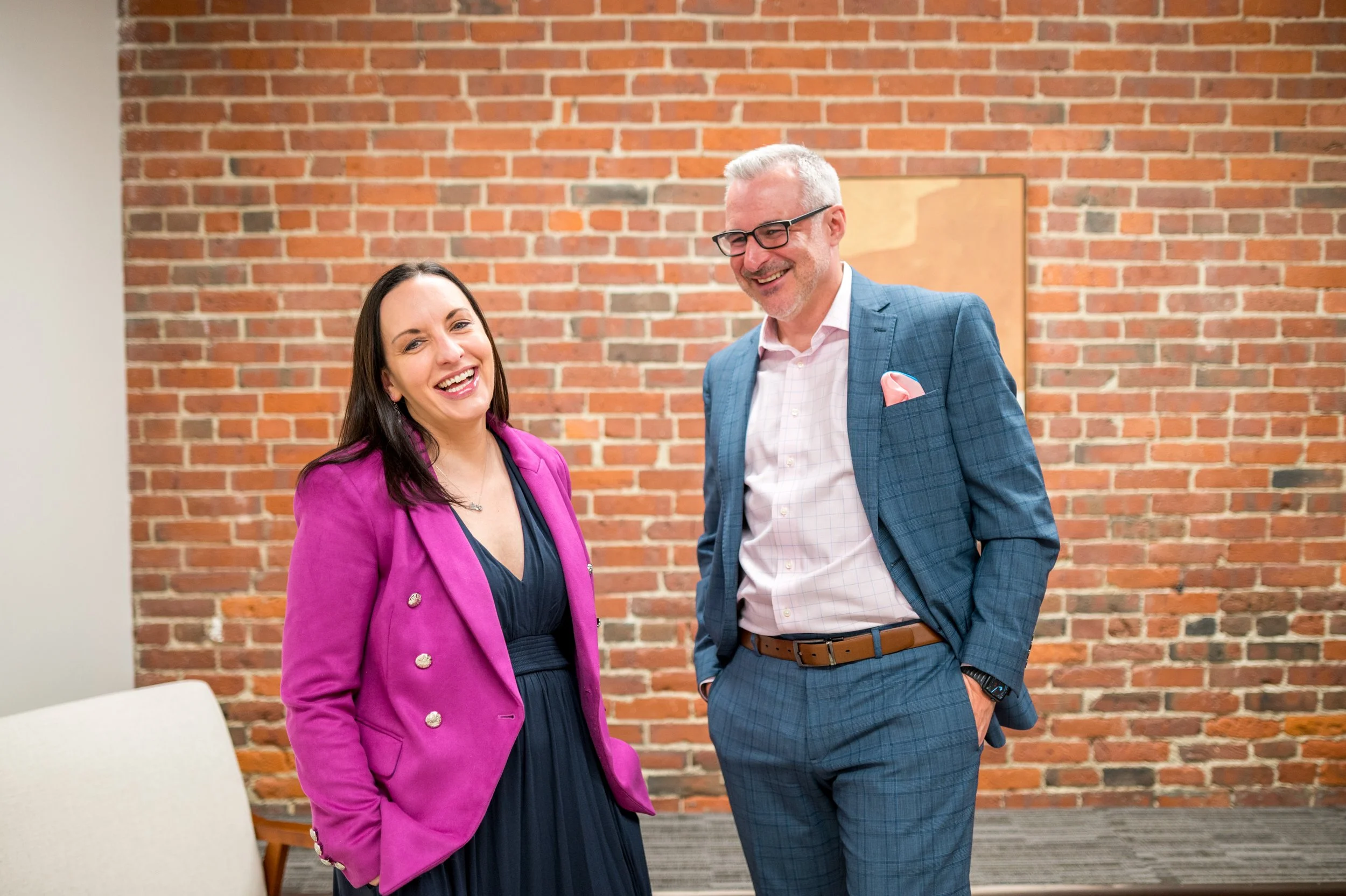 Michaele and Dan laughing at each other