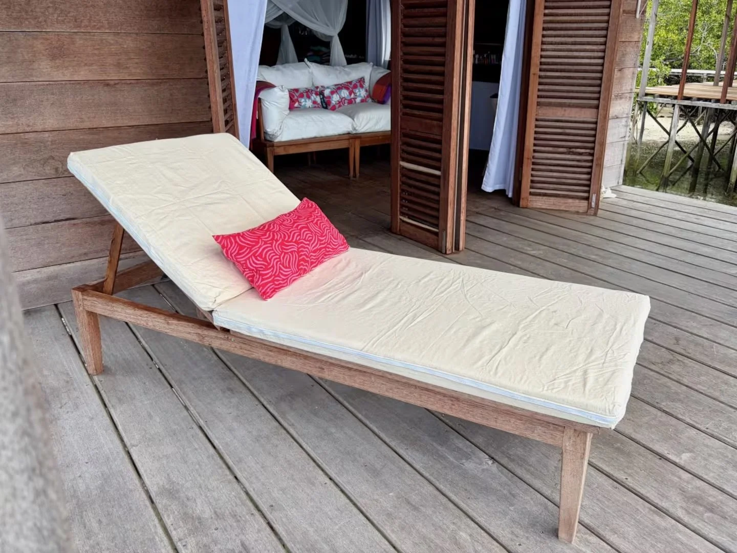 Sunbed on the overwater terrace at ipyum.jpeg