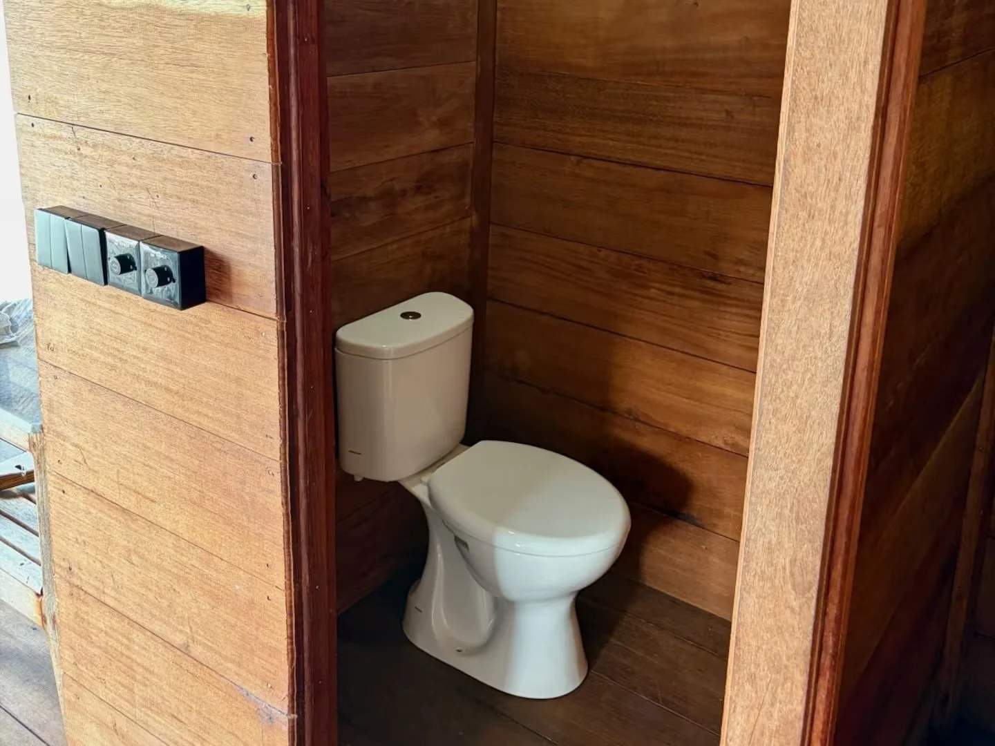 Private toilet in the overwater guest house at ipyum.jpeg