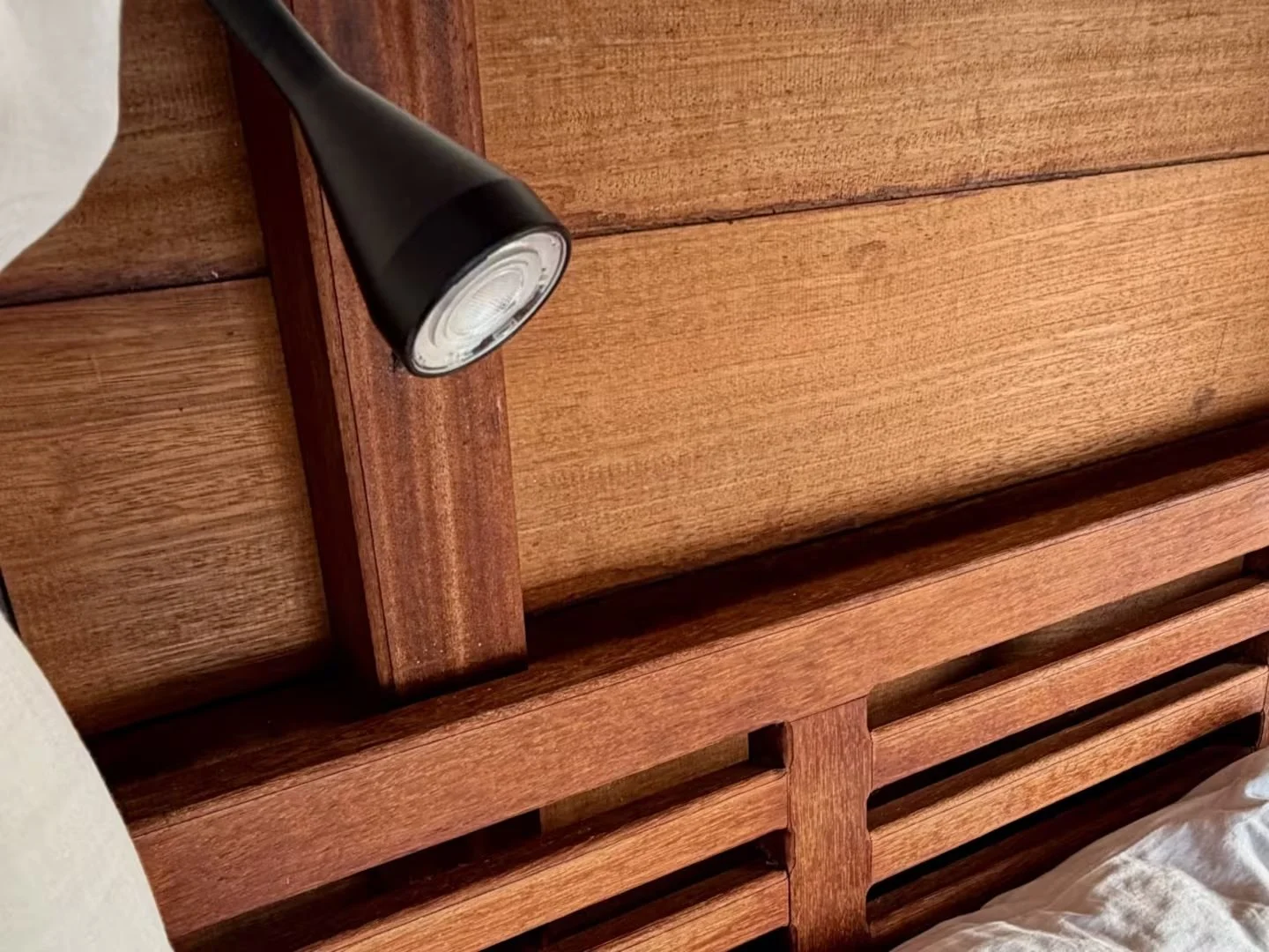 Individual adjustable reading lights inside the bed canopy at ipyum.jpeg