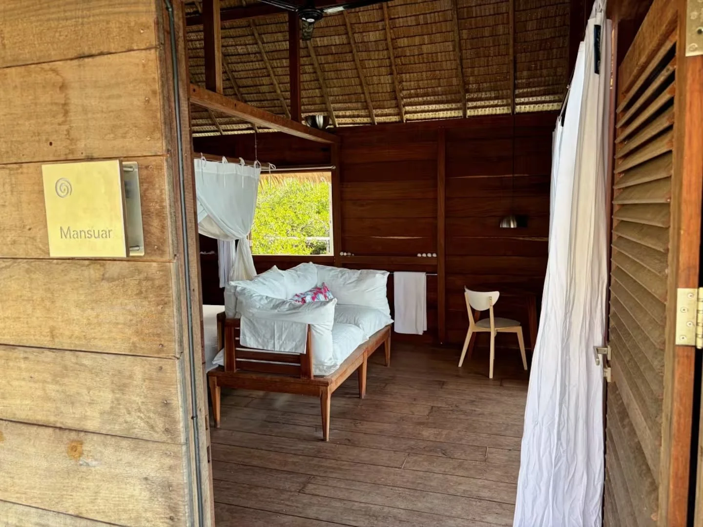 Overwater guest house entrance at ipyum.jpeg