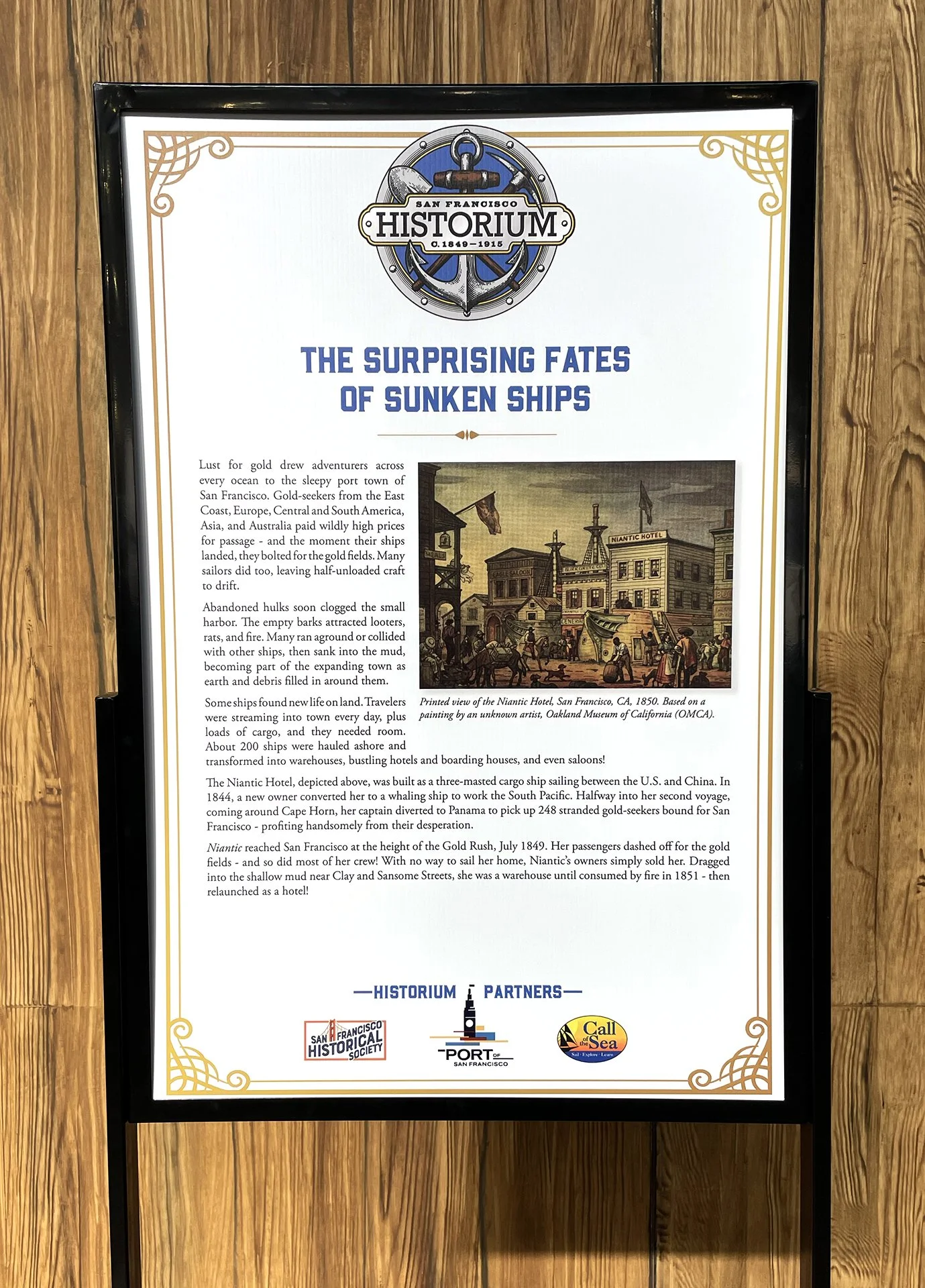 Information display about sunken ships and the history of the Niantic Hotel in San Francisco, with a historical illustration of the Niantic Hotel, 1850s.
