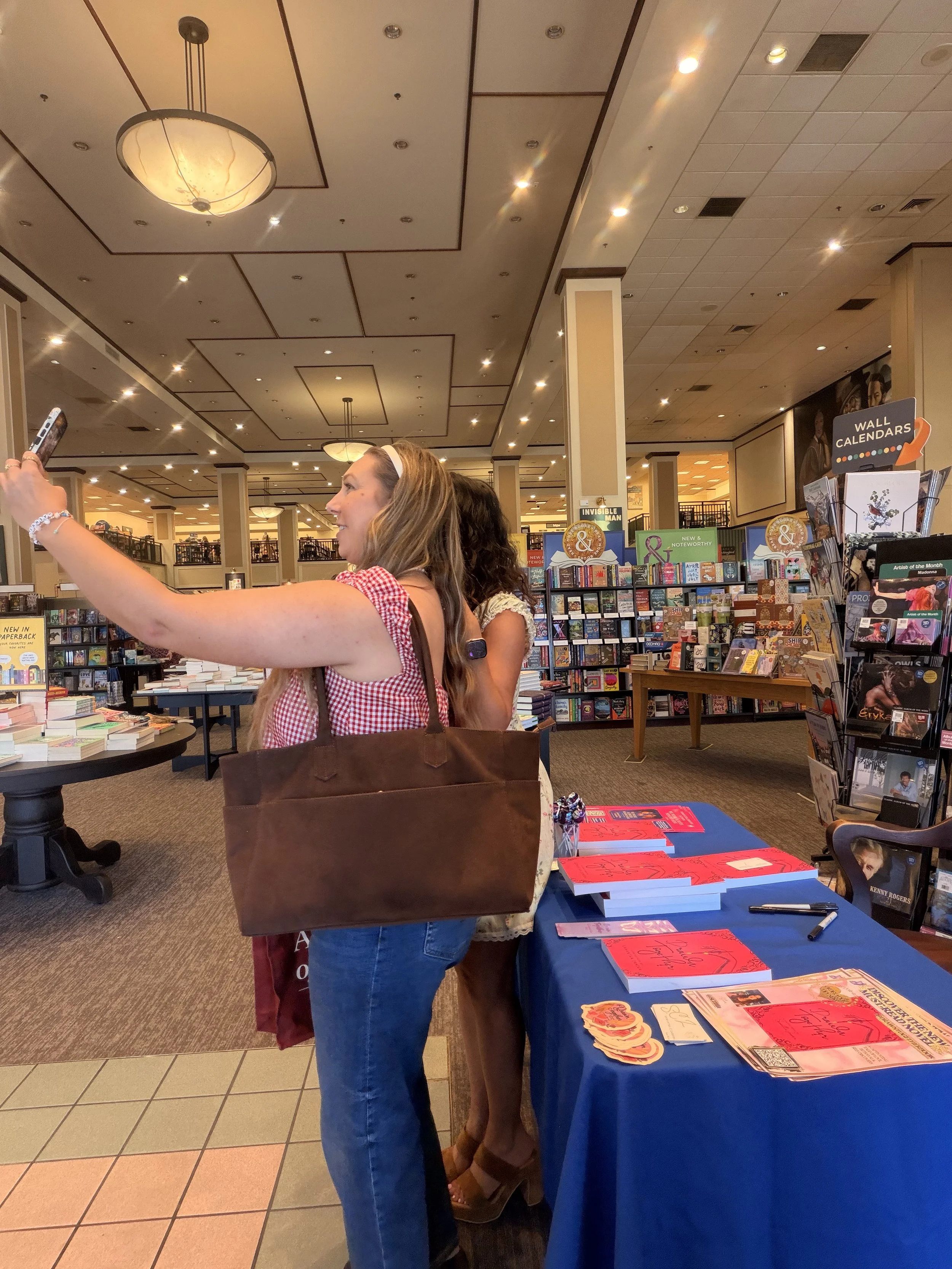 Two local authors connecting during Samantha Zamora's Barnes & Noble book signing at The Promenade at Westlake.
