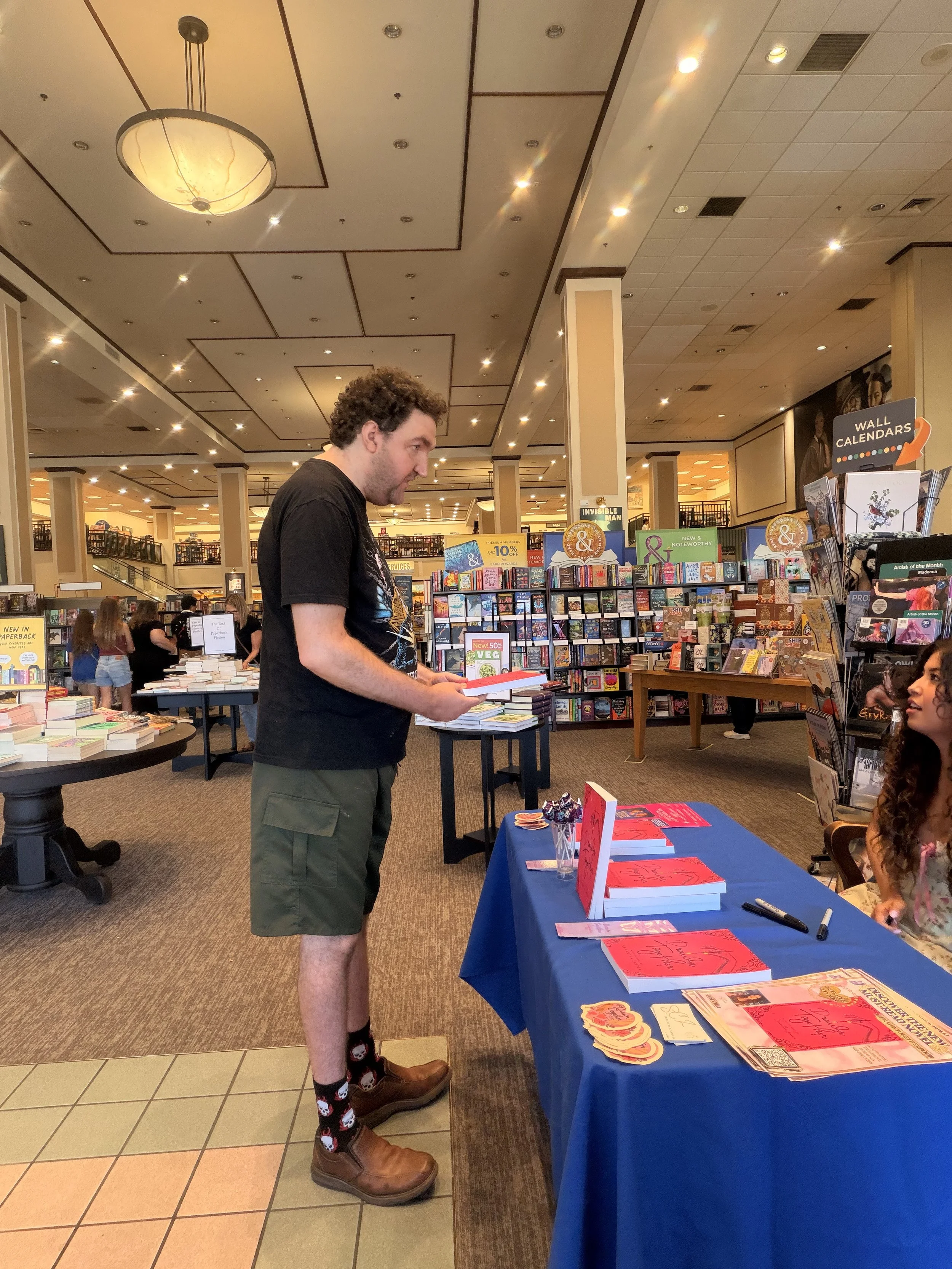 A reader visiting author Samantha Zamora's signing table at Barnes & Noble in Westlake Village, California.
