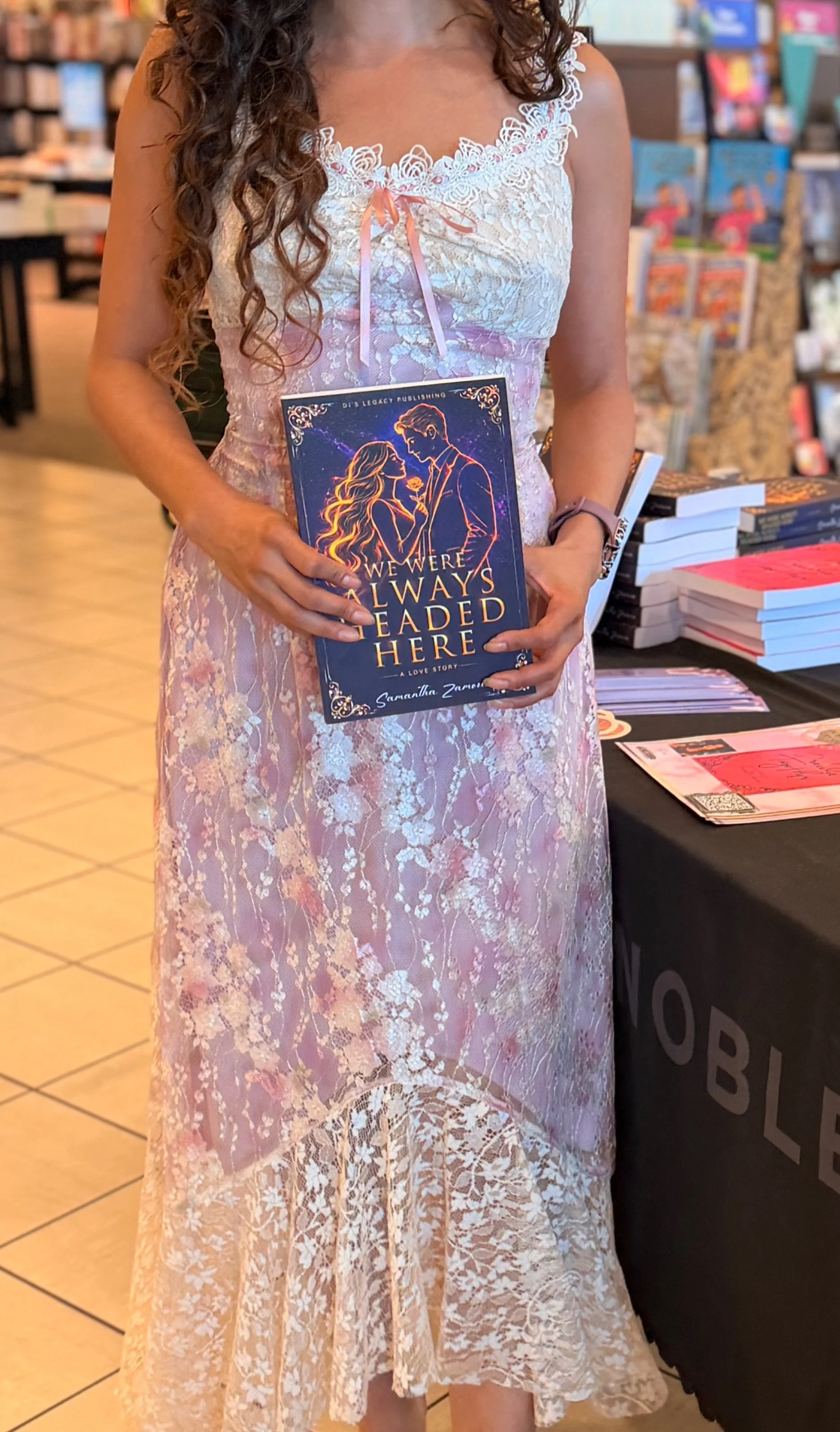Samantha Zamora showcasing We Were Always Headed Here in her Lacemade signing-day look at Barnes & Noble in Torrance, California.