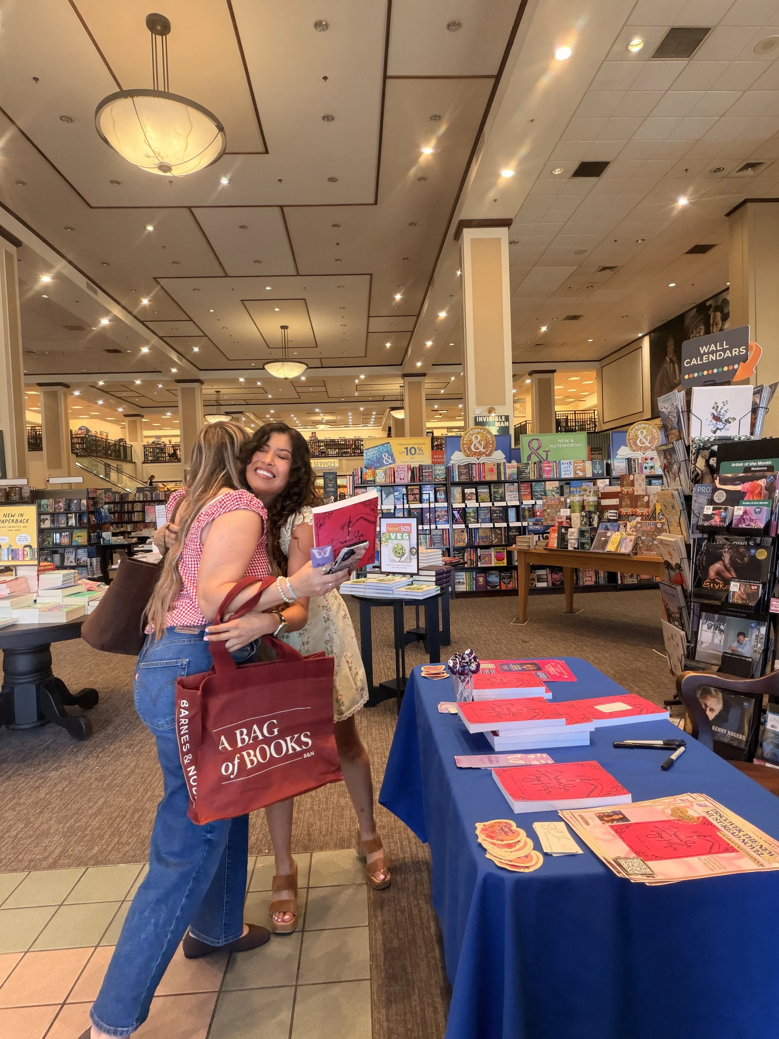 Samantha Zamora meeting a fellow local author and reader at her Barnes & Noble signing in Westlake Village, California.