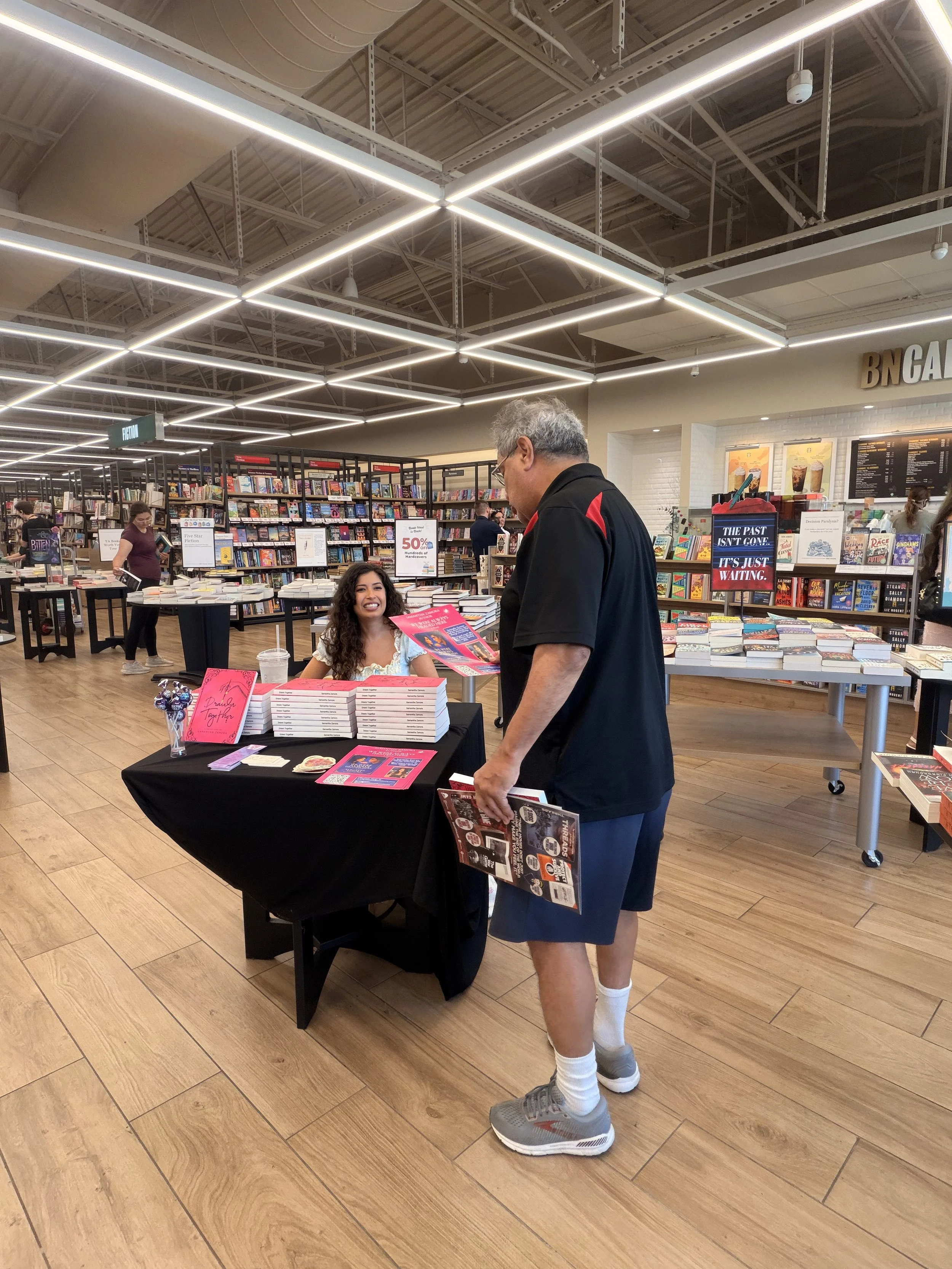 Author Samantha Zamora meeting a local teacher during her Barnes & Noble book signing at The Veranda in Concord, California.