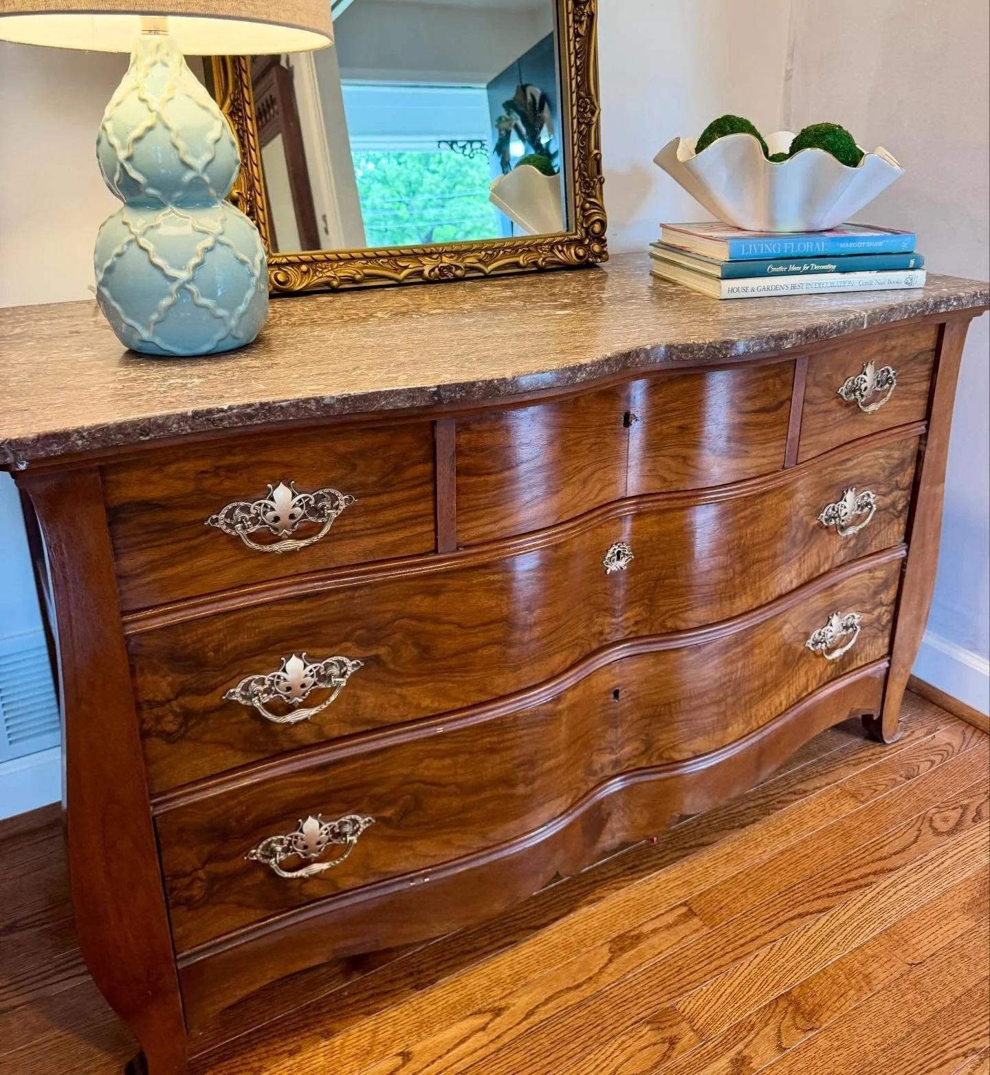 For Sale: $500 
📍Birmingham 

So excited to offer this absolutely gorgeous vintage dresser featuring a classic serpentine front silhouette with beautifully bookmatched wood grain and elegant ornate brass hardware. This piece has been thoughtfully re