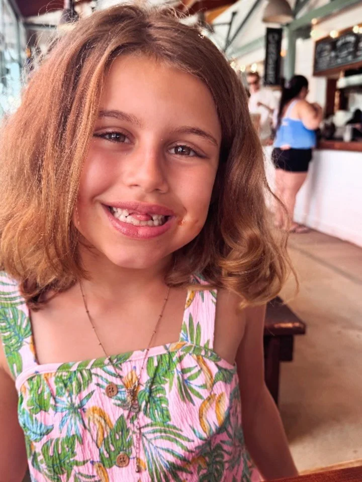 This kiddo just lost her SECOND tooth in a week! And it wasn&rsquo;t even the corn on the cob that got her, it was a dang hot dog !