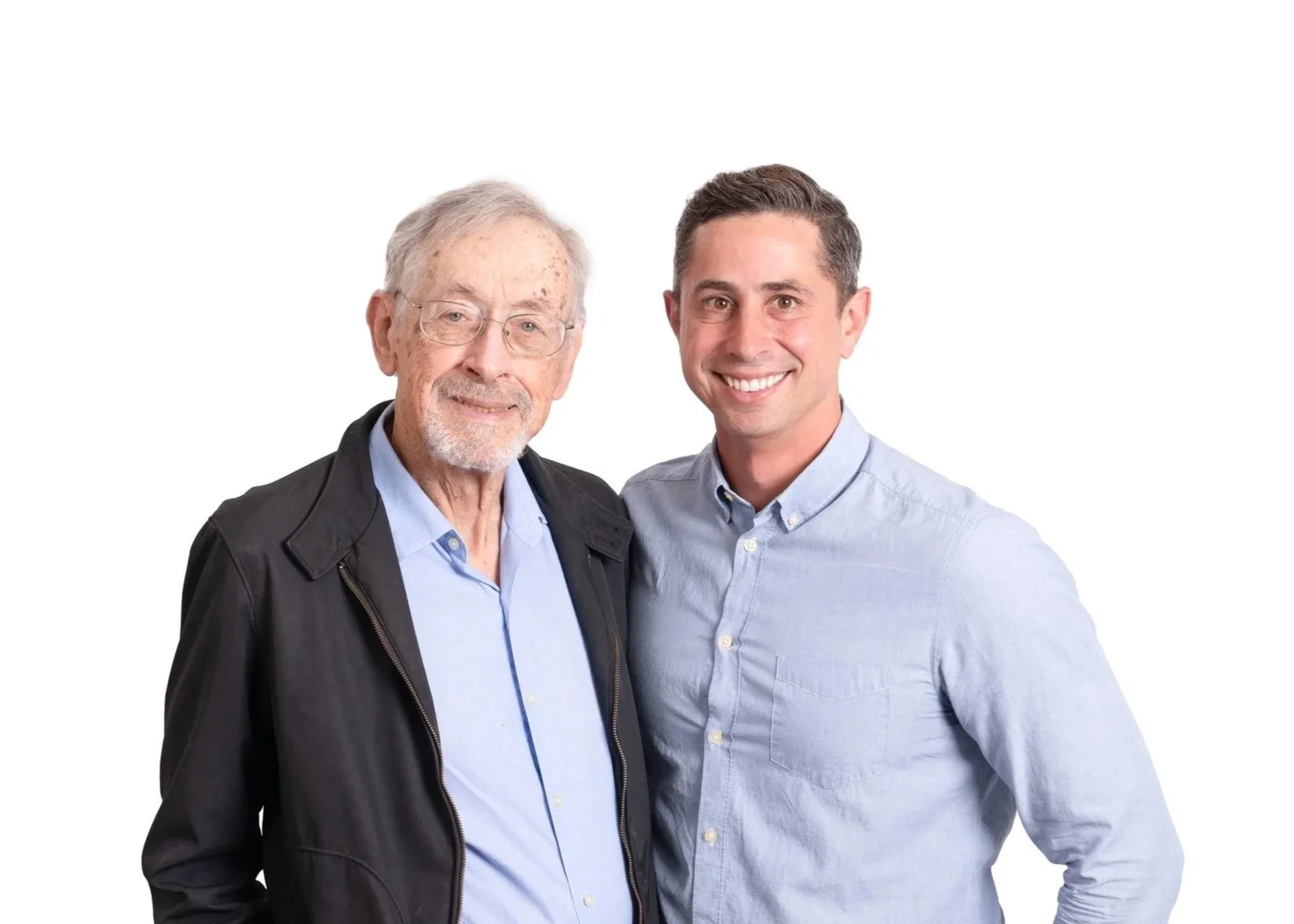 Bill Fletcher and Eli Fletcher standing next to each other smiling.