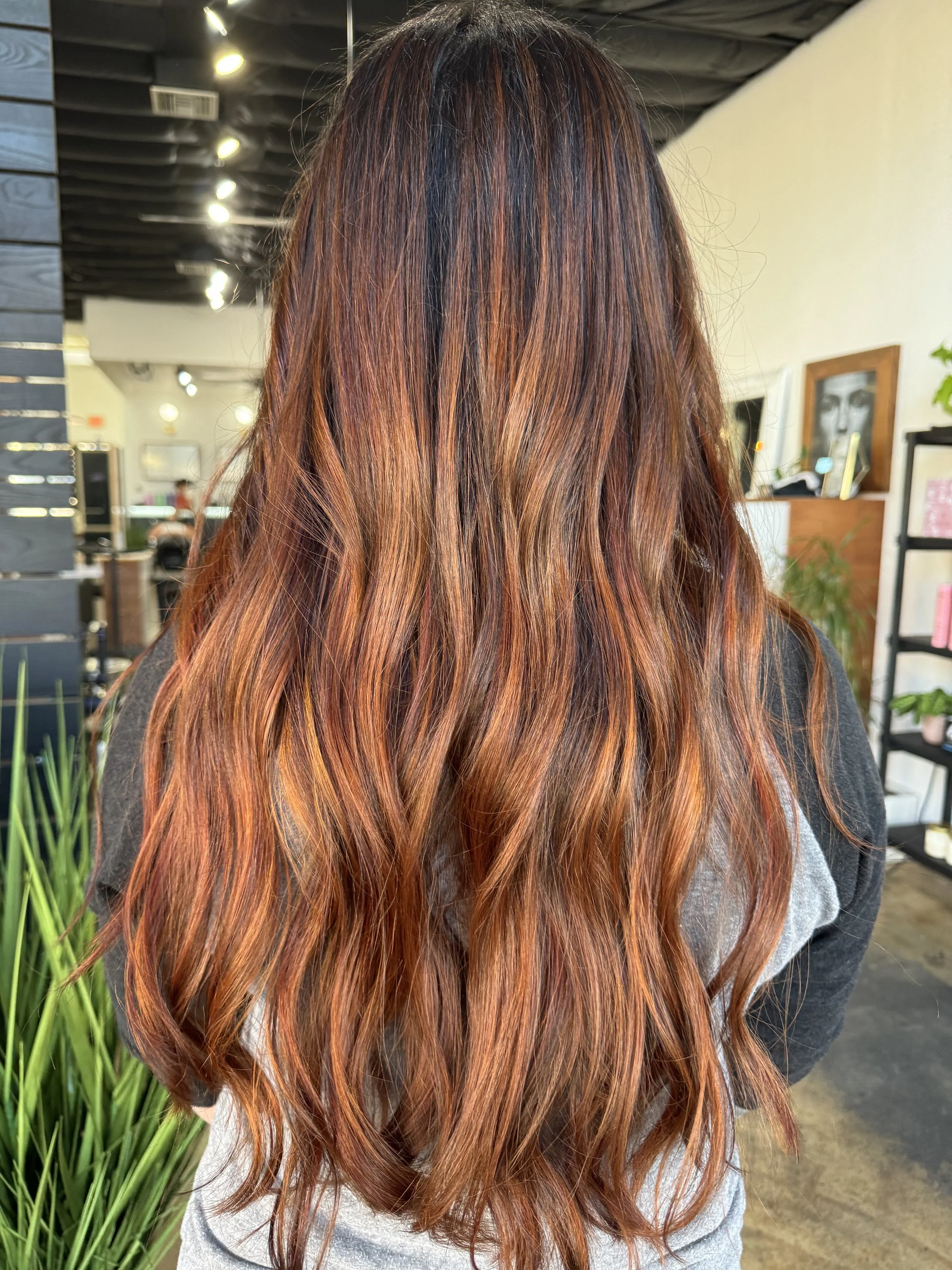 Salon customer with new long natural braids