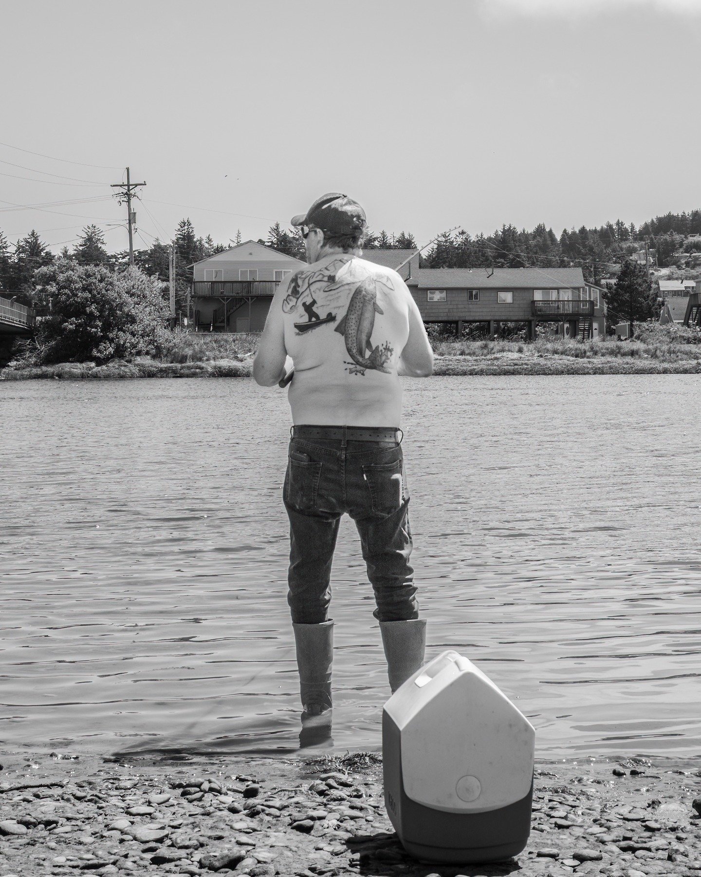 Shooting with my monochrome camera to slow down and see things differently. I ran across this fisher using his plugs and body art to catch a prized spring Chinook. There were lots of hooks in the Nestucca today but few fish in evidence - except the o