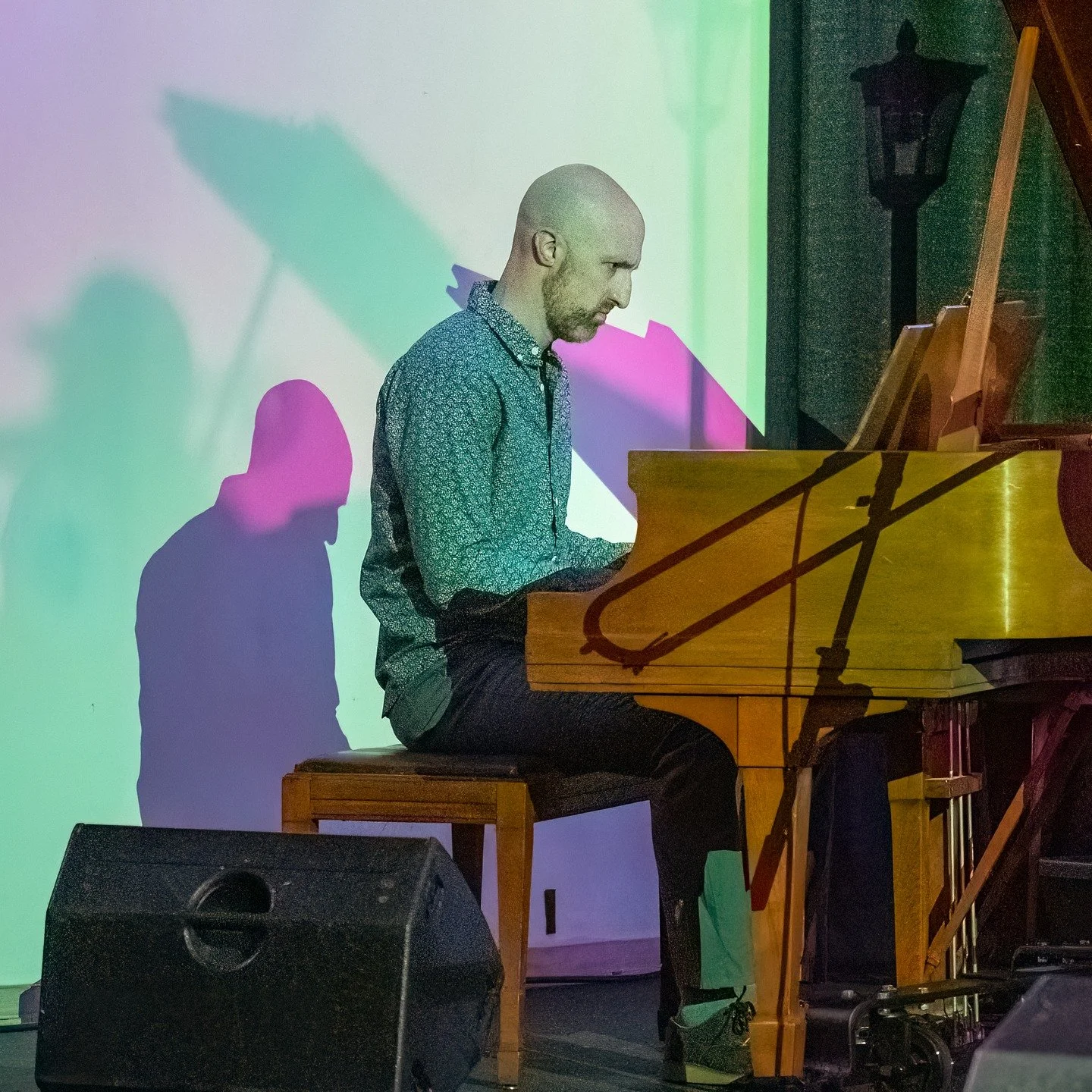 Michael Elson playing at Alberta Abbey. Micheal is an always in demand pianist, performing all over town. He was featured with an Allstar band sponsored by The Jazz Room at Alberta Abbey. I could not resist this shot of Michael and his shadow on the 