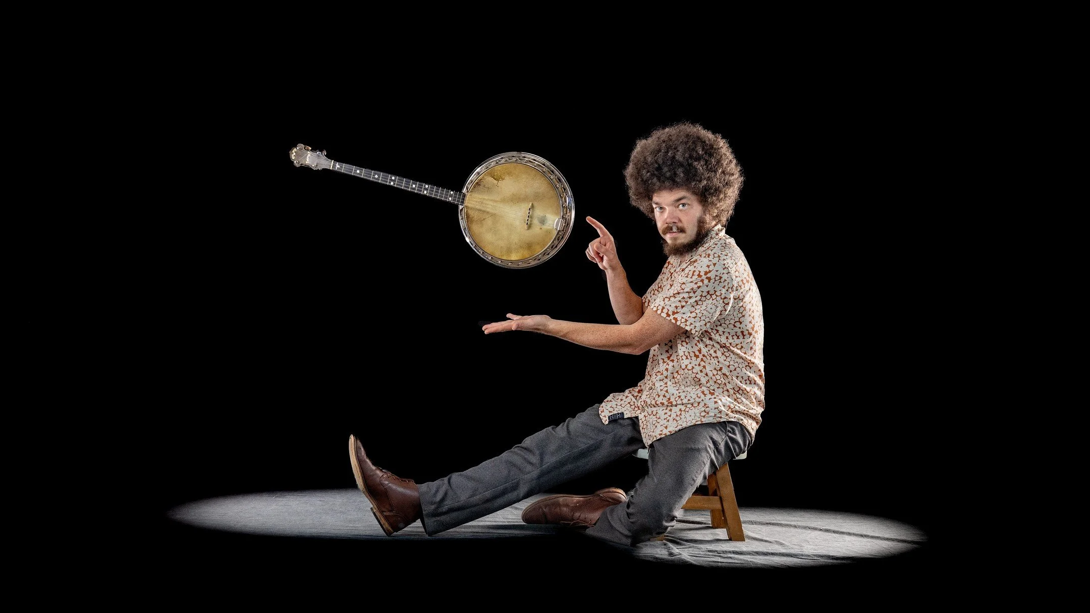 Tevis Hodge, Jr. is a magical artists capable of playing old timey blues and the hottest Chicago licks - and fully capable of levitating any string instruments to become its best self. I photographed Tevis Hodge, Jr. at Pro Photo Supply's studio Five