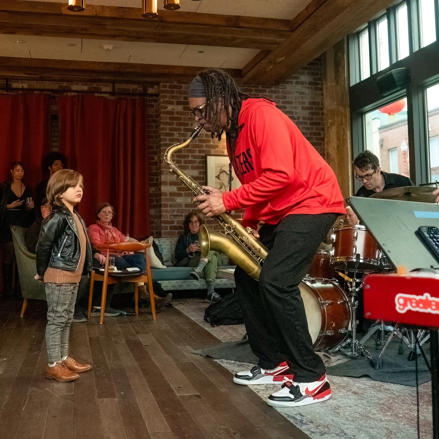 Devon Phillips and his quartet played tonight at the Lovely Rita holding down Friday evening for PDX Jazz. It was a remarkable performance by Devon and his band. All the evidence needed is in this photo of Devon and his new best fan. The fun continue