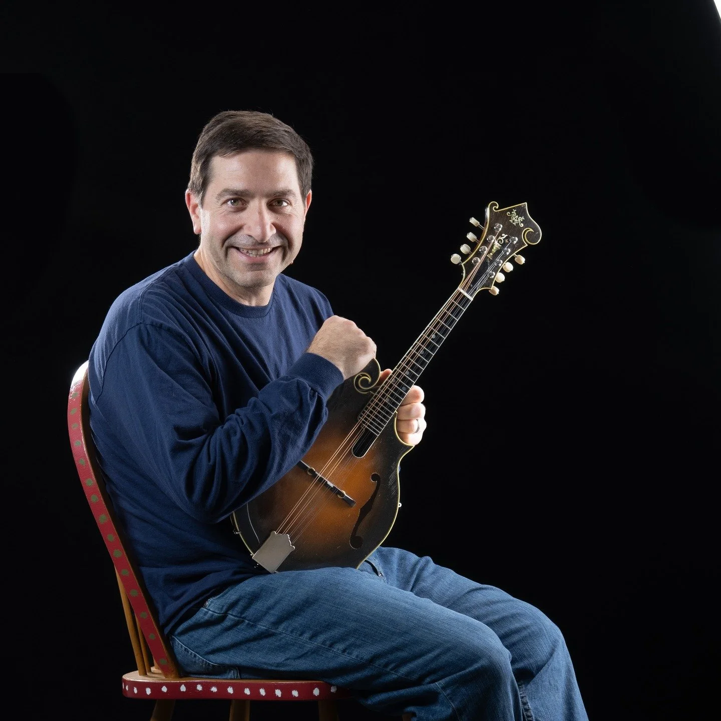 Micheal Luperini is an excellent mandolin artist who, like many who could, has chosen to have a day job instead of venturing into the ranks of professional musicians. His performance schedule consists of sitting in with others at jam nights at variou