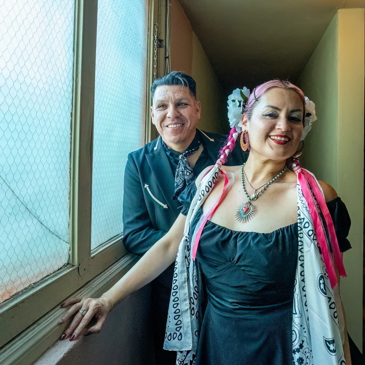 As I was putting my gear away in the green room after the Las Cafeteras show, Hector Flores asked if I could take a few photos of Denise Carlos and himself in a narrow stairwell. The light there was miserable but I quickly moved them to a window wher