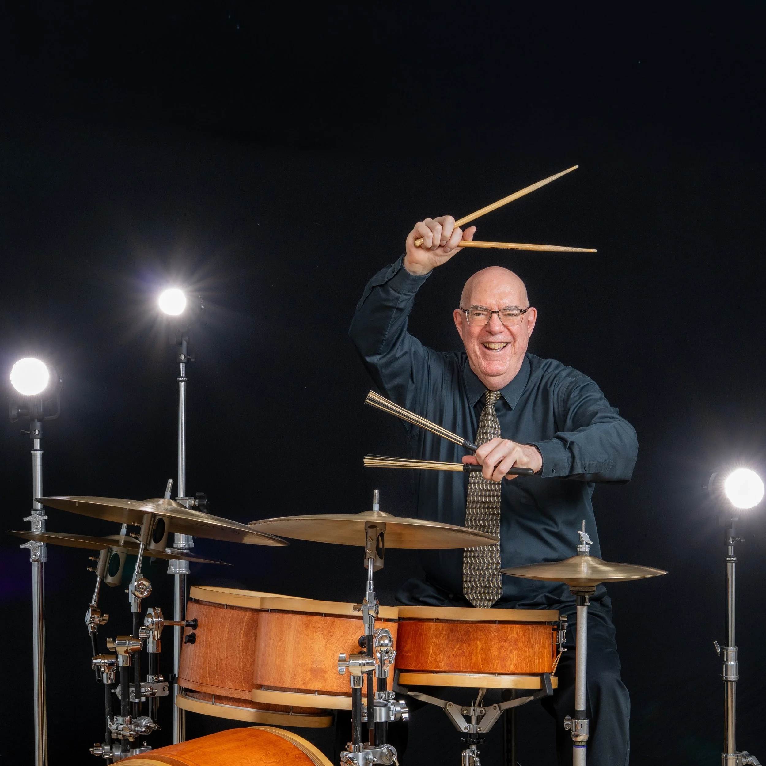Long-time fixture of the PDX jazz scene, drummer Kevin Deitz spent the morning in Becker Canyon Studio. Kevin brought his beautiful kit. We experimented with lighting approaches and then settled on this look with studio lights to his side. Kevin's ha