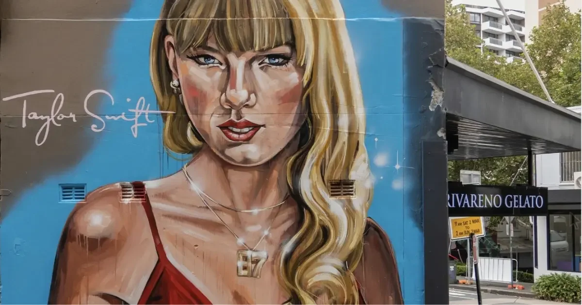 A mural of Taylor Swift on a wall