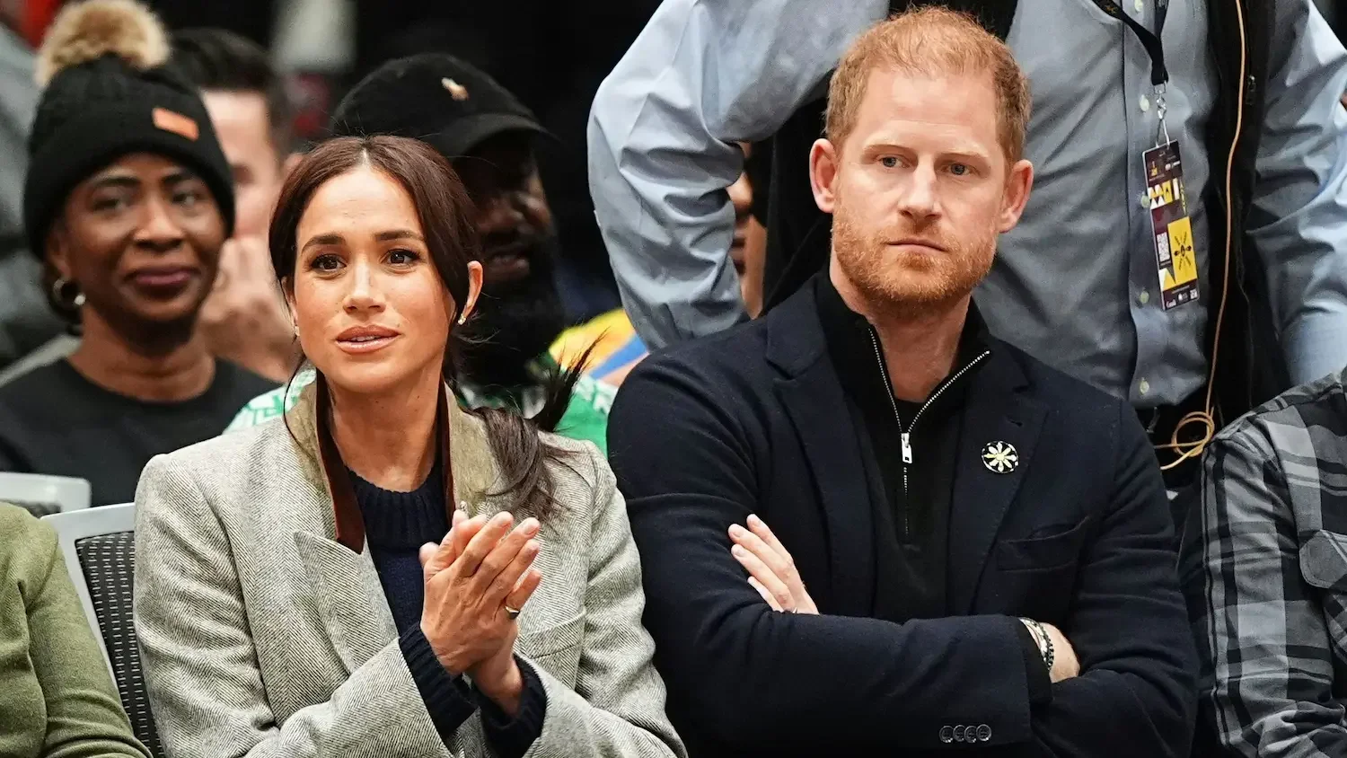 Meghan and Harry Sussex looking a little disgruntled