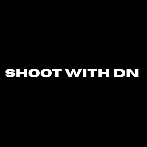 Black background with white text that says 'SHOOT WITH Dn'.