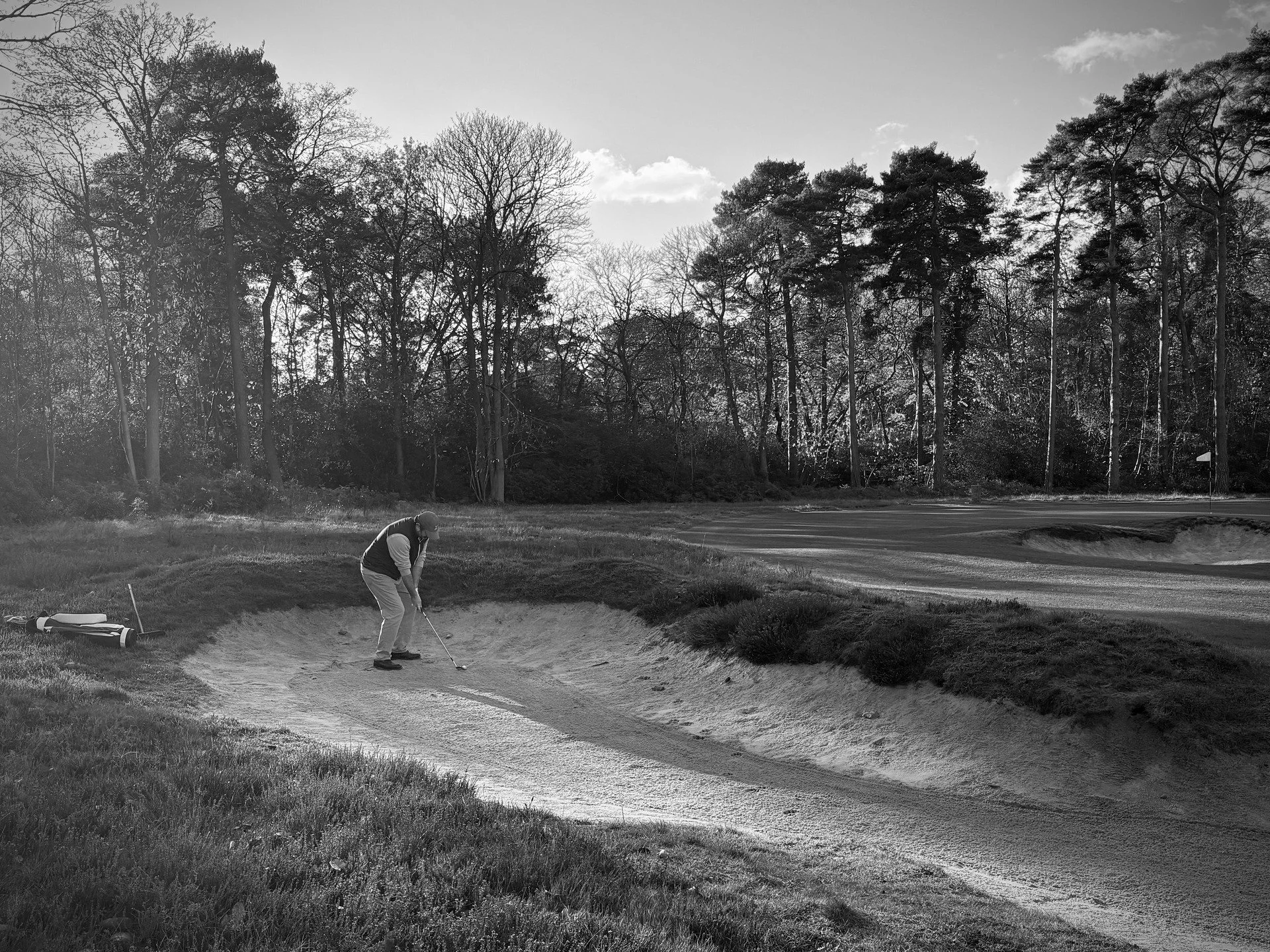Many thanks to @pitchmarks for this beautiful shot of his opponent playing from Simpson's bunker to the left of the 9th green that we reclaimed from rhododendron 4 years ago. 

It's good to know that the sun still shines occasionally in England.