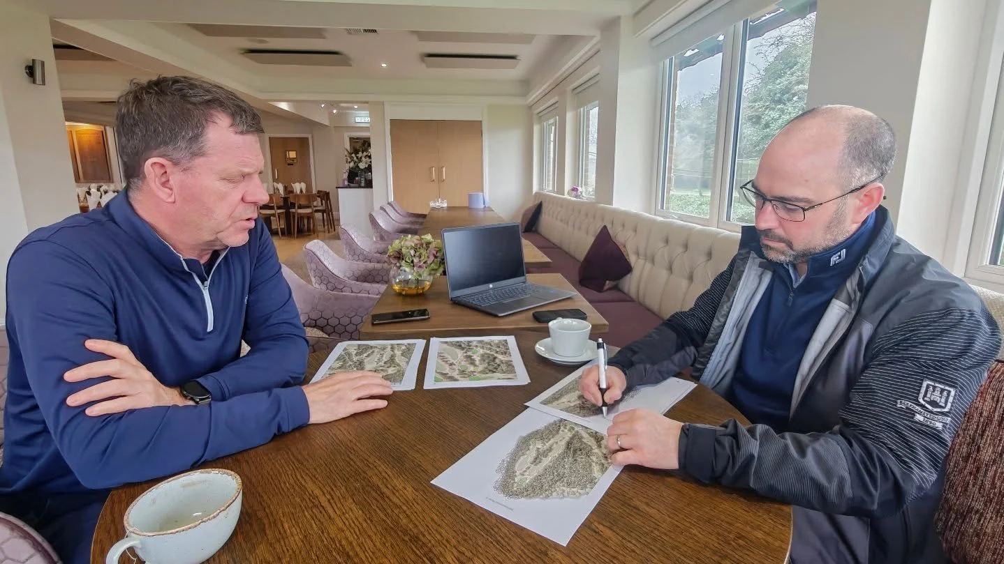 Frank discussing the first draft of the long-term course plan this morning with MD Dan Blesovsky.